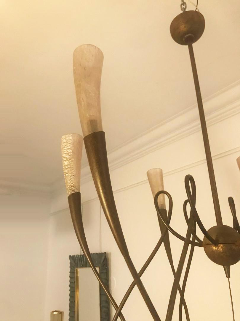 Italian brass and glass chandelier by Terzani
Dark brown metal scroll design six-arm chandelier with artistic glass shades shades.
Designed by Jean-Francois Crochet (France, b.1949) for Sergio Terzani, late 20th century 
Wired to the America
