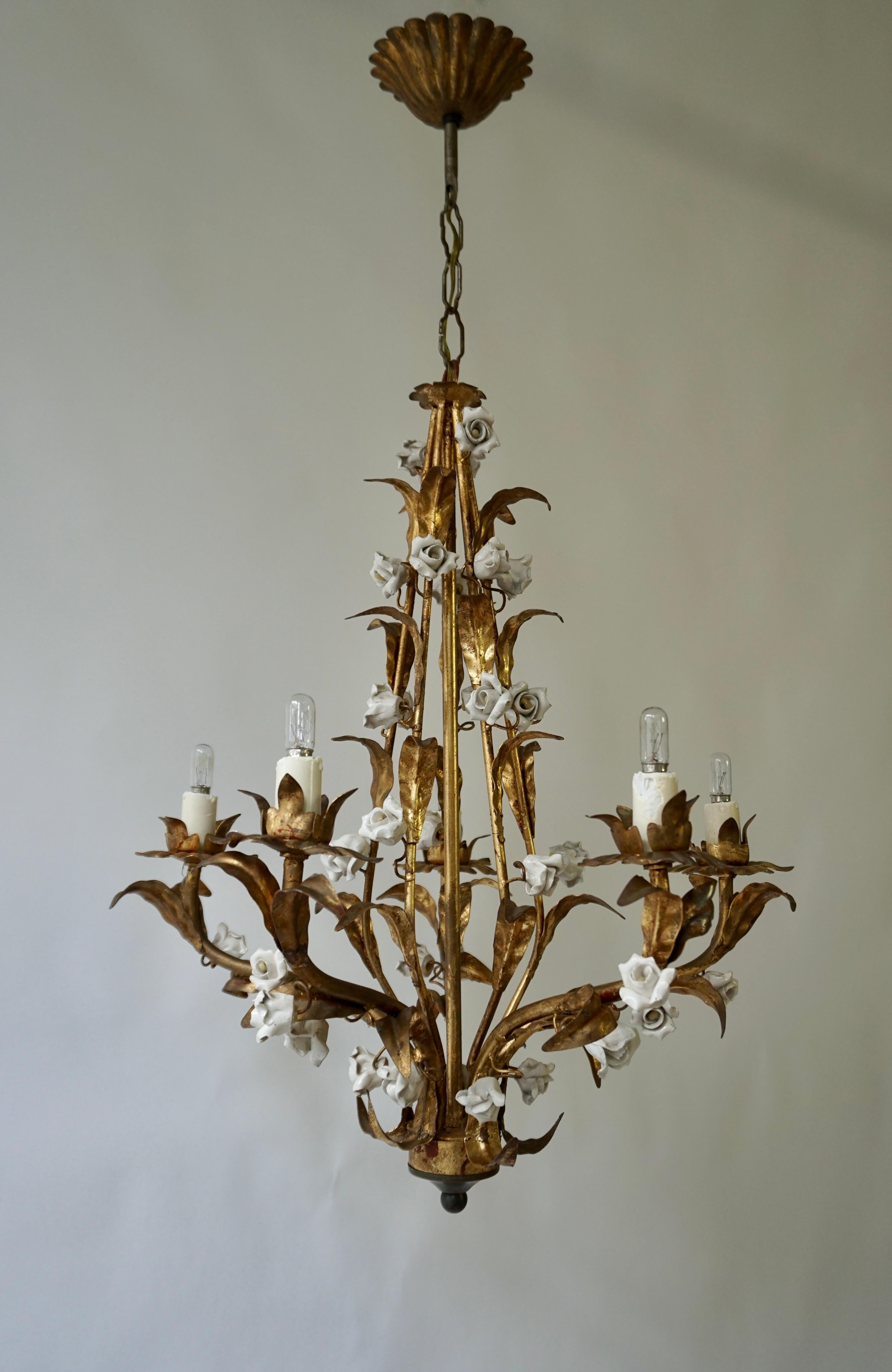 Two vintage, charming Italian hanging chandeliers, in brass with white ceramic handmade flower décor.
We also have the same model with pink flowers.

An exquisite patinated bronzed antique gold gilt Tole chandelier with 35 intricately hand crafted