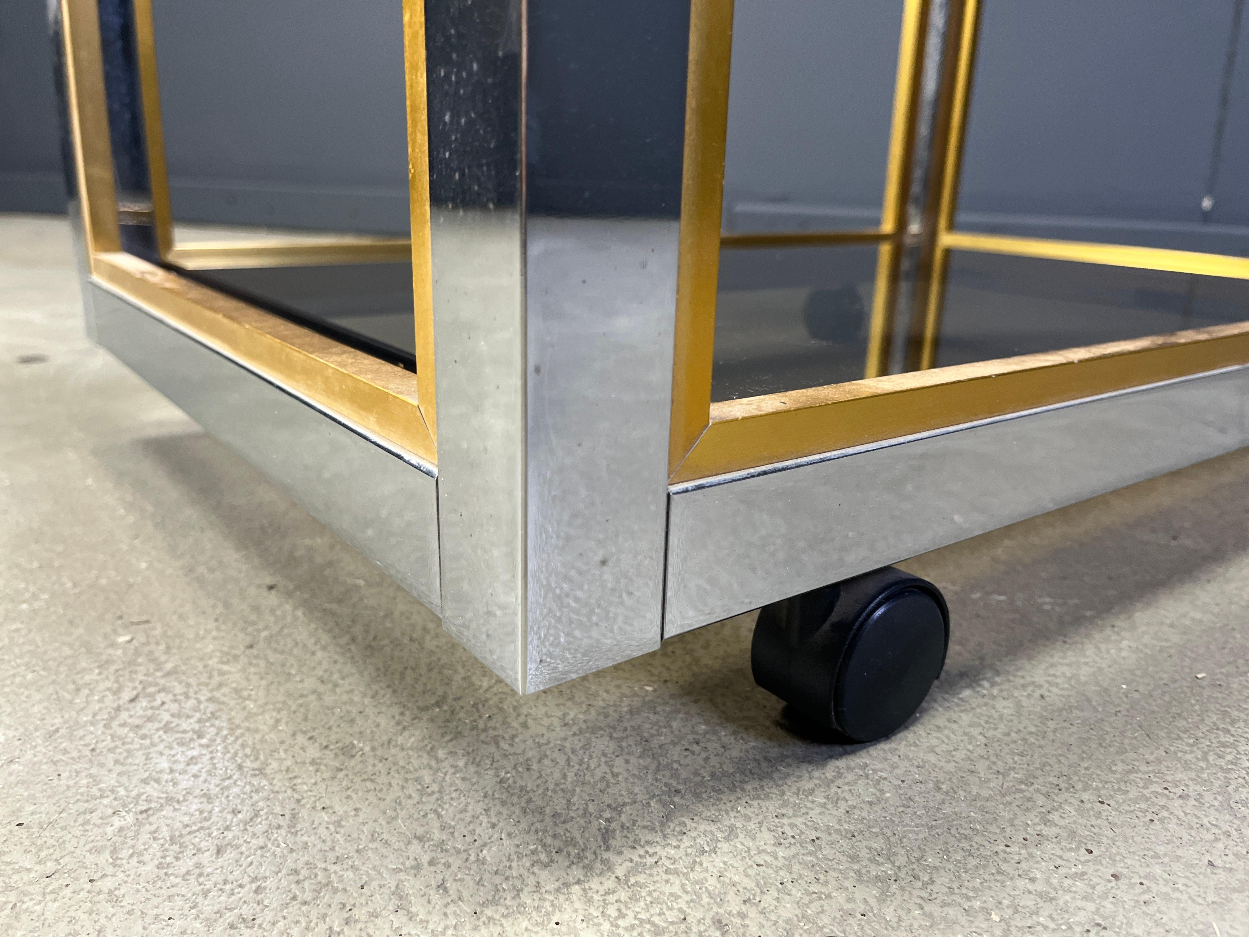 Hollywood Regency Italian brass and chrome drinks trolley in the manner of Romeo Rega, 1970s For Sale