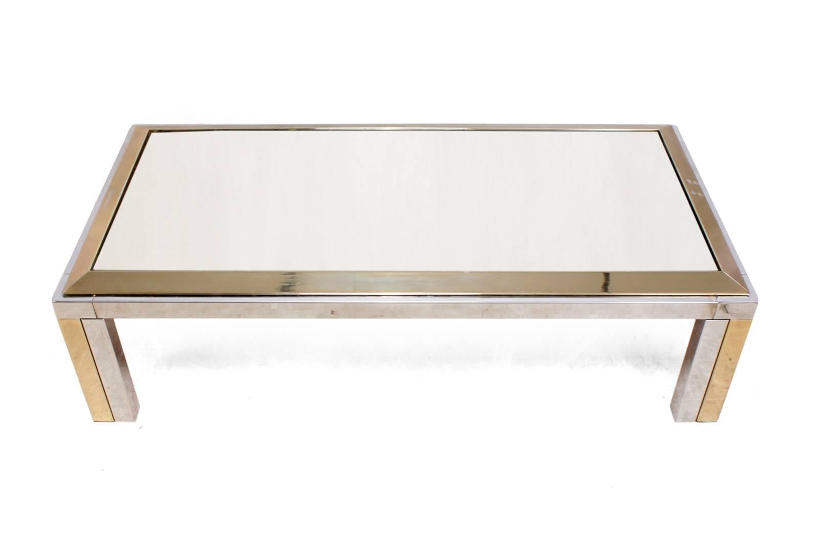 Italian brass and chrome table, circa 1970
A 1970s chrome and brass coffee table produced in Italy, This has an original, gold colour mirrored top with some marks in the gold colour top frame as shown in photographs.
Age: 1970
Style: Mid-Century