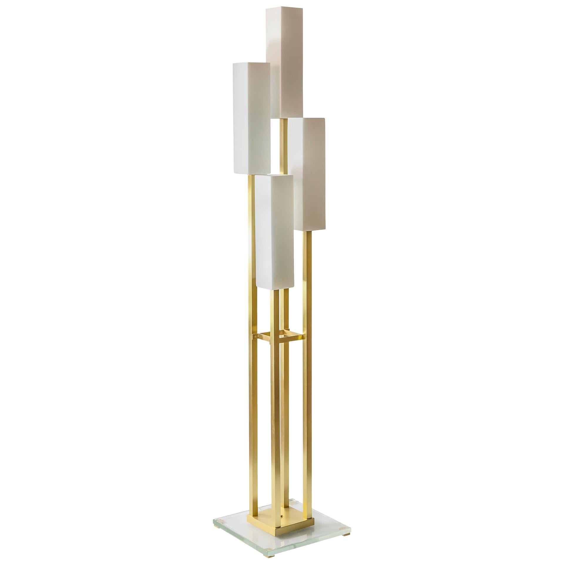 Italian floor lamp is designed in solid satin finish brass, Murano glass base and frosted glass shades. Weight 23.8 kg.


 