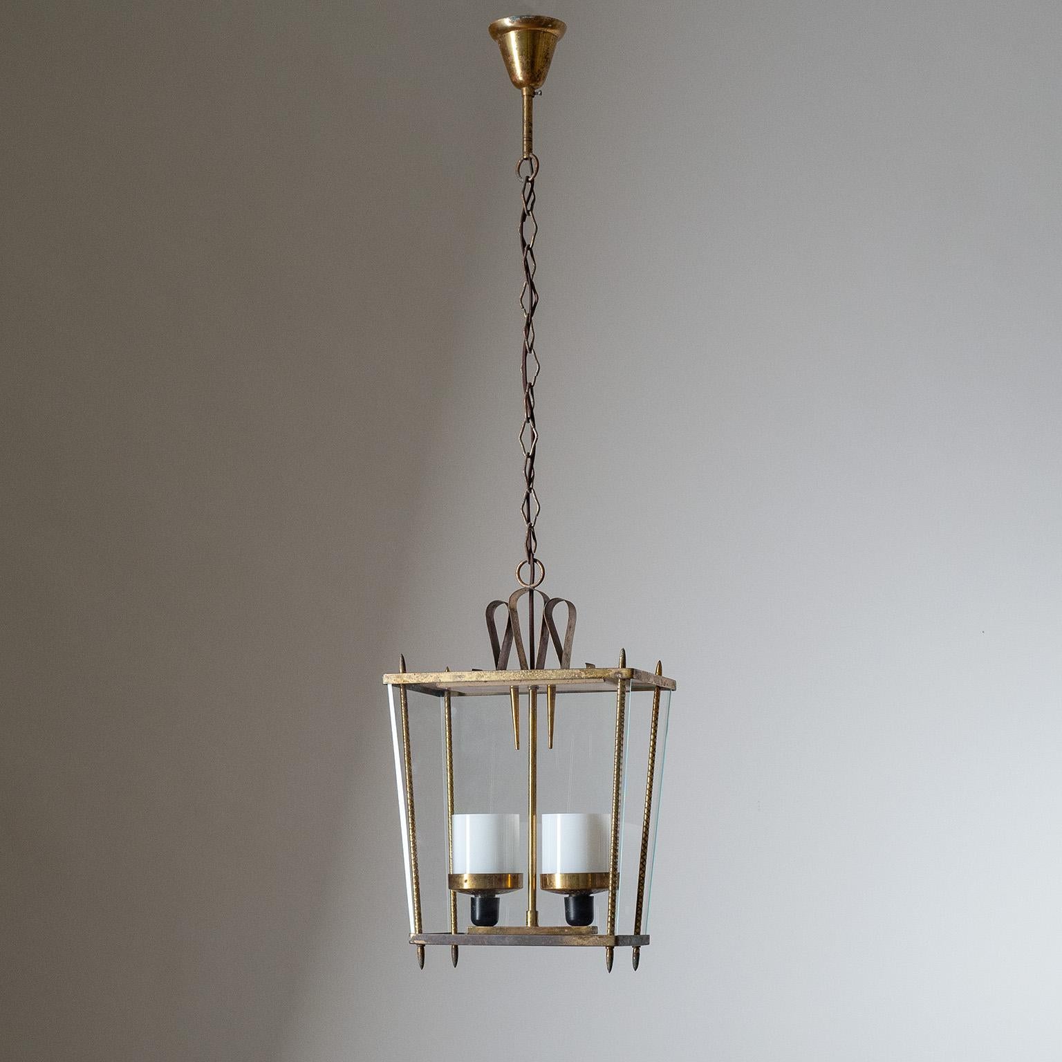 Fine Gio Ponti style Italian lantern from the 1940s. Brass and lacquered steel structure with two glass panes and charming brass decorations. Two original E14 sockets with new wiring and small opaline glass diffusers. Heavy patina throughout the