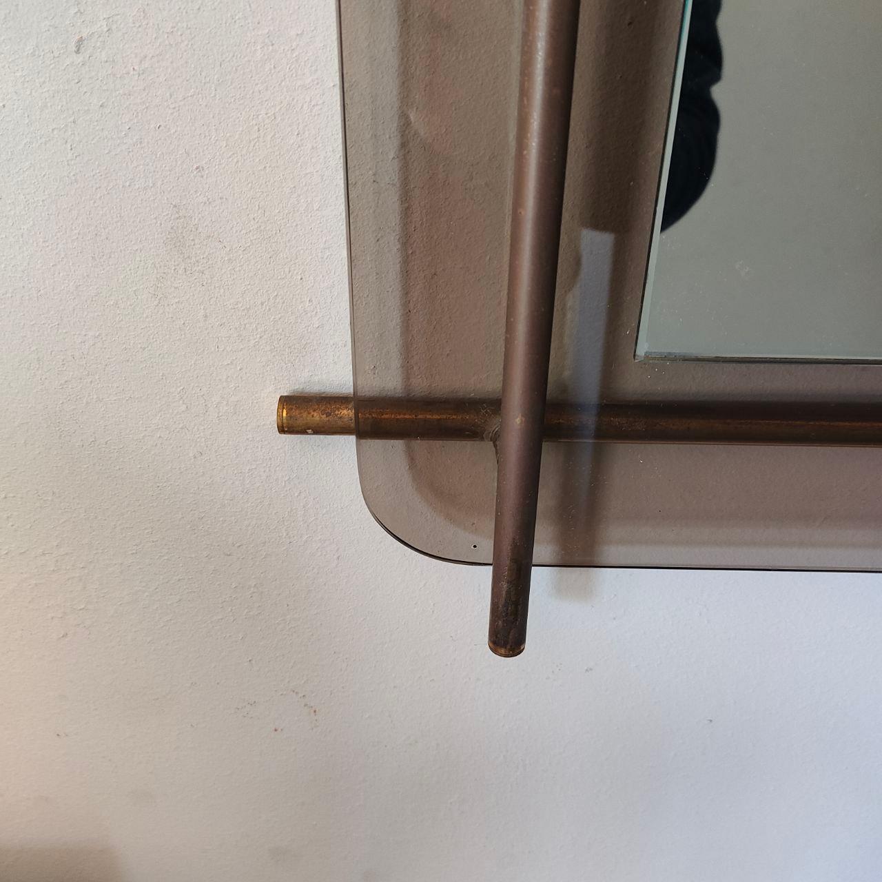 Brass Italian brass and glass mirror by Renato Zevi for Metalarte, 1970s For Sale