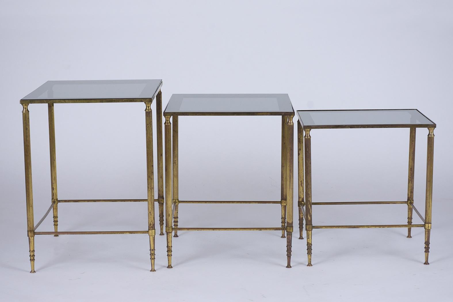 Mid-Century Modern Mid-Century Italian Brass Nesting Tables with Tinted Glass Tops For Sale