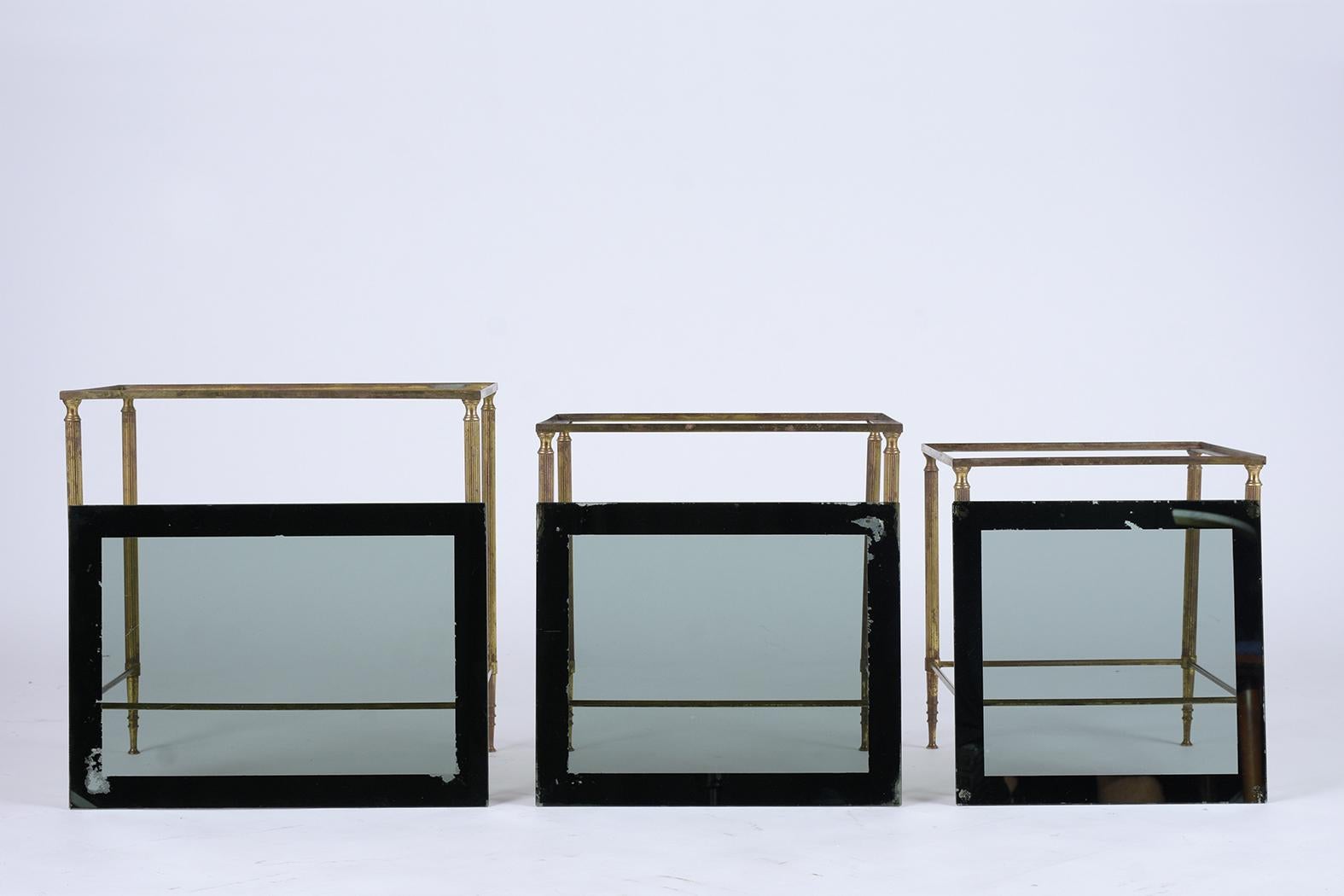 Polished Mid-Century Italian Brass Nesting Tables with Tinted Glass Tops For Sale