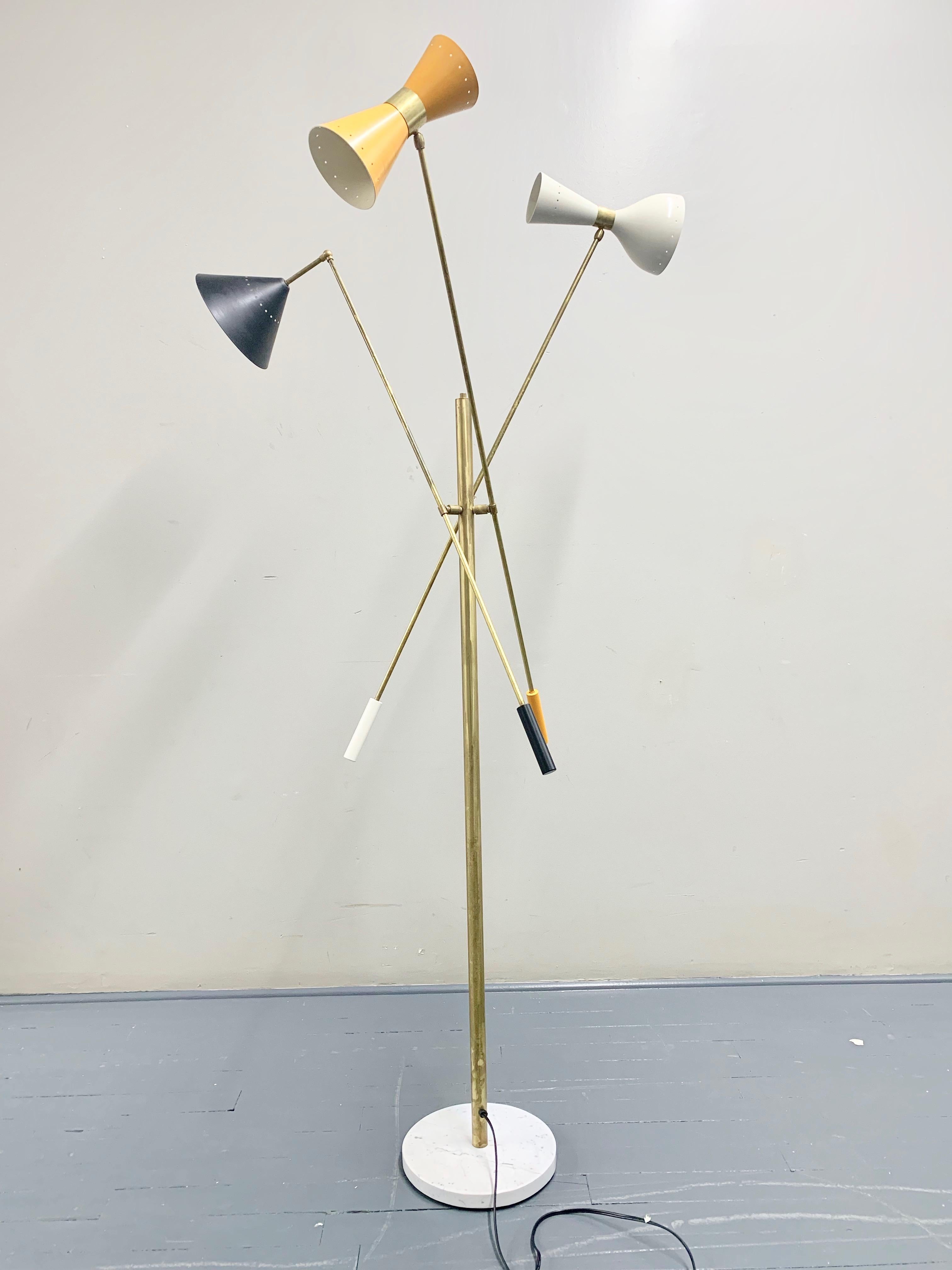 Italian midcentury style floor lamp adjustable three-arm lamp inspired by the Italian 1960s vintage iconic designs. Three different shades multi-color, Carrara marble base, arms and body made of solid brass and hand wax painted. Each arm features