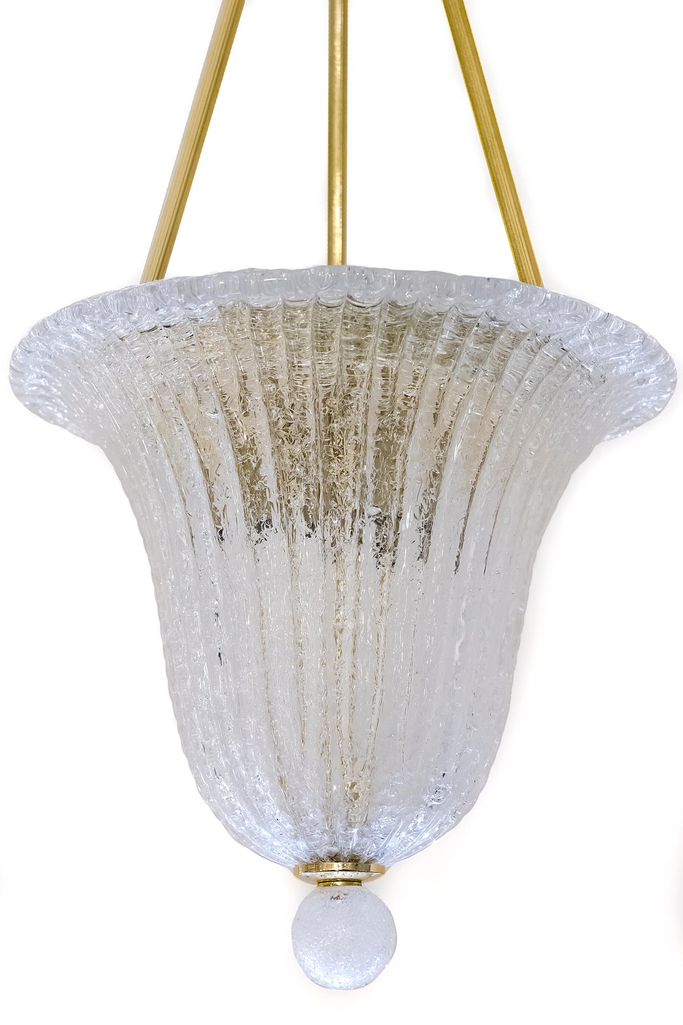 Italian chandelier lantern is made of brass with Murano glass shade.
This chandelier includes 3 pieces. E14 bulbs that lights down.

It is in a very good original vintage condition.
 
 