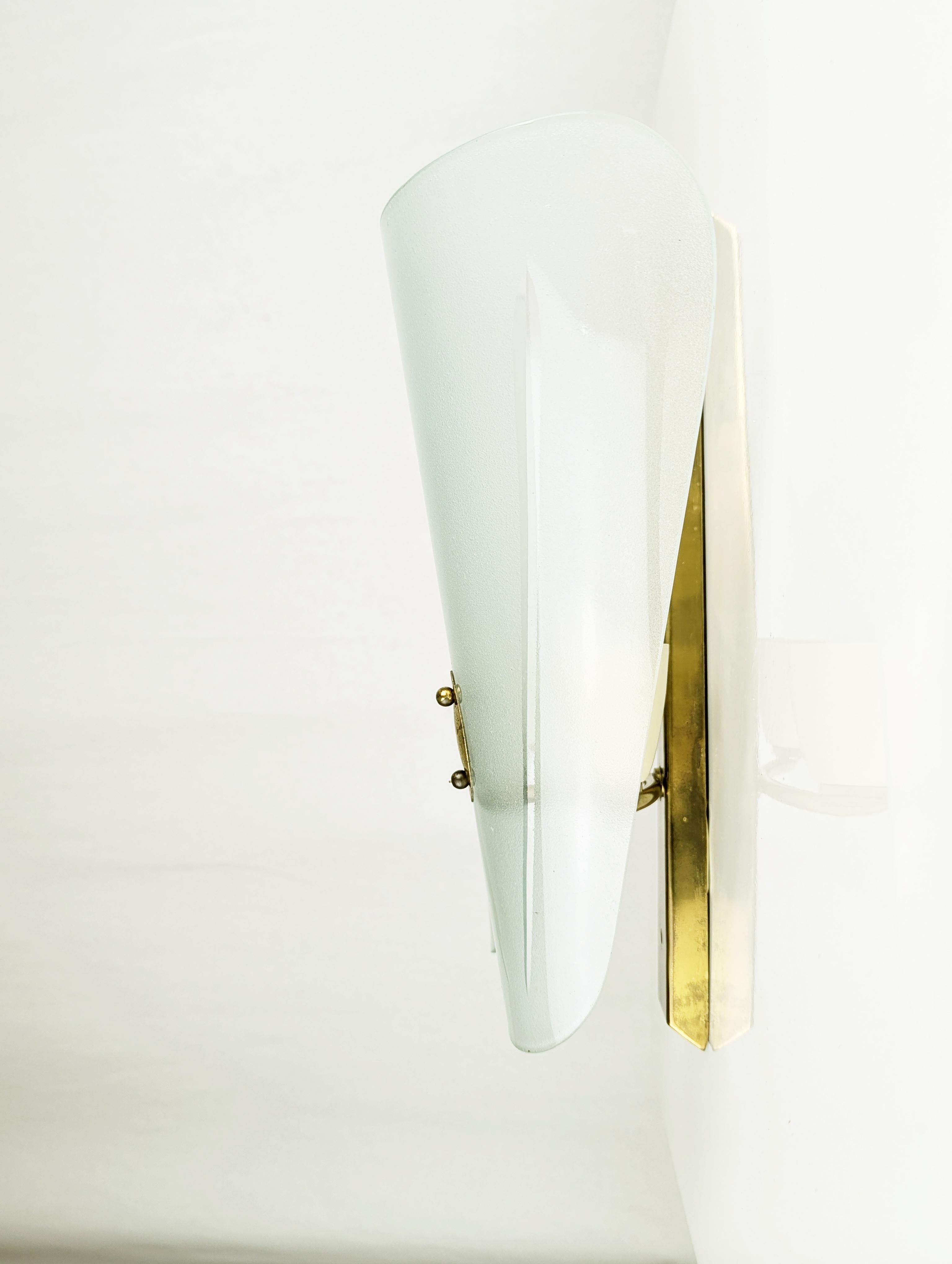 Mid-Century Modern Italian Brass and Sandblasted Glass Mid-Century Sconce with curved glass shades For Sale