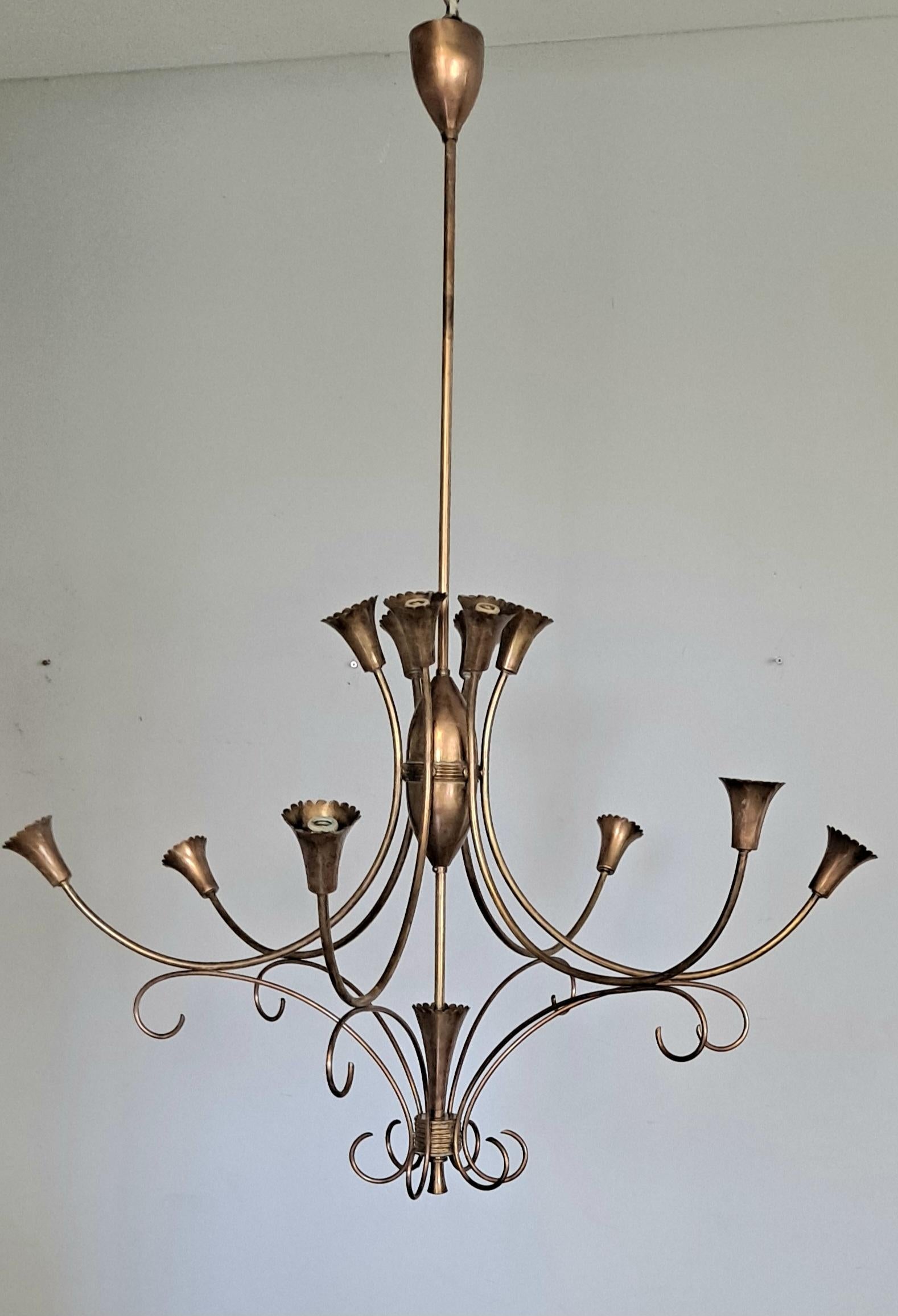  Italian chandelier from 1950 s. Brass base and ceramic -brass  sockets.
Romantic and beautiful Italian design chandelier . The upper part can be dismantled and putted back together easy . The USA Continental shipping standard parcel $200 . In home