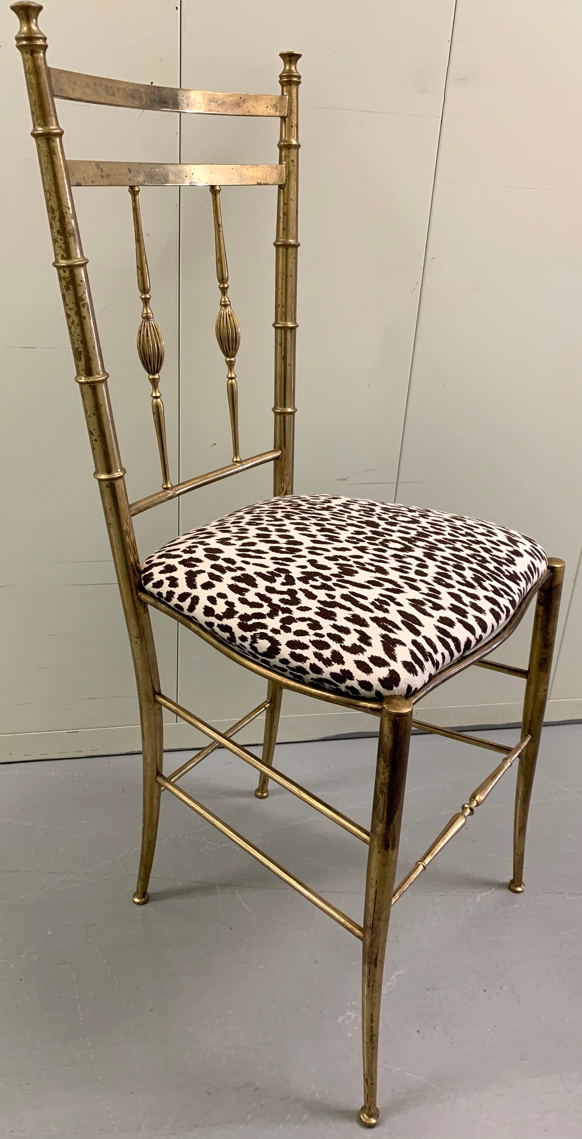 Italian brass Chiavari chair. New seat cushion newly upholstered in Raoul Textiles brown printed leopard linen fabric. Overall as found unpolished patina to the solid brass frame. Stamped ‘Made in Italy’ on the underside. Chair can be polished to a