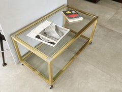 Italian Brass, Chrome Plated Metal and Glass 1970s wheeled coffe/side table
