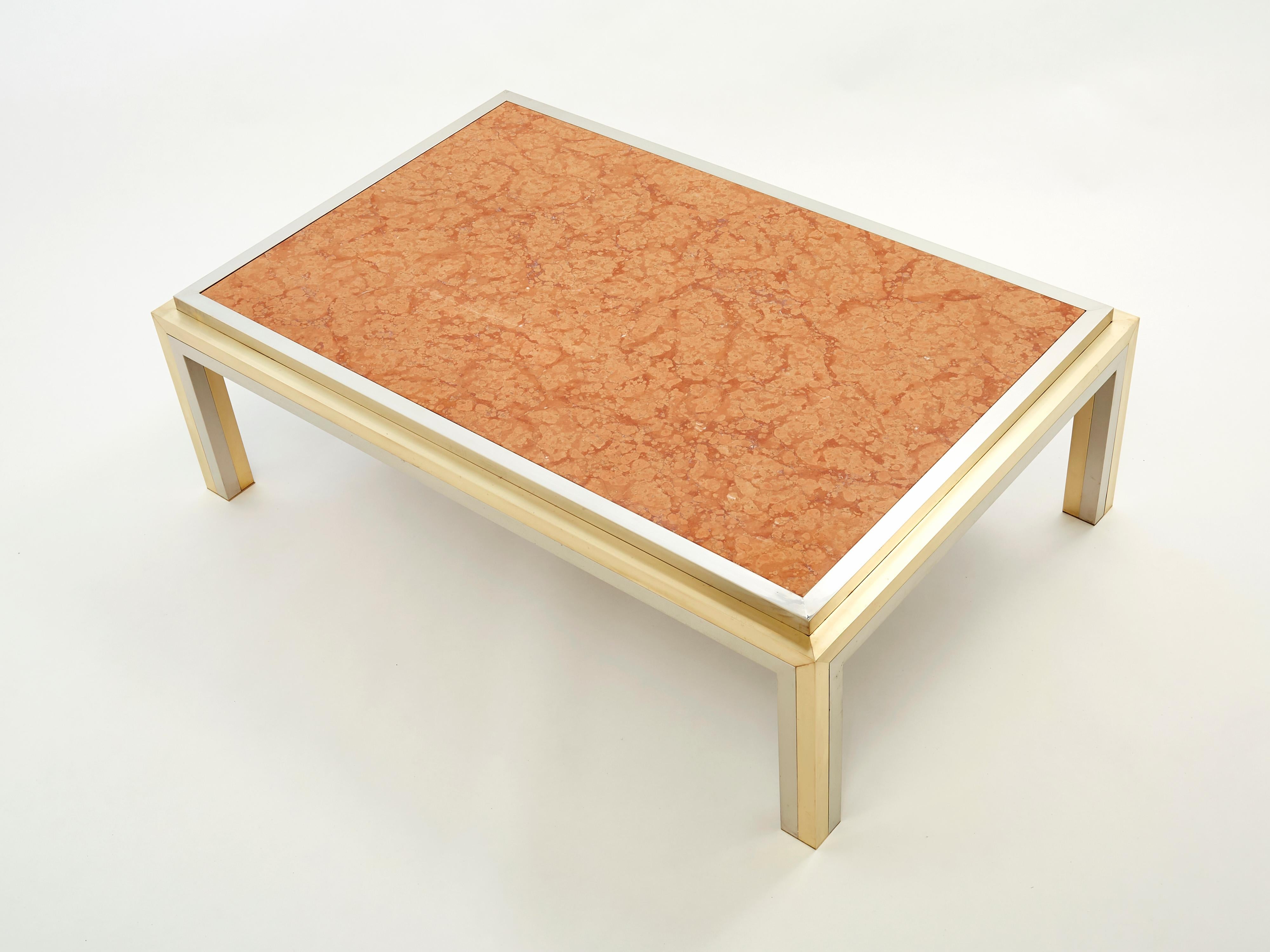 A beautiful piece of design, this coffee table will be the focal point of your living room. Symmetrical brass and chrome elements match perfectly with red Italian marble from Verona, the result being a sleek decorative piece. Made in Italy for