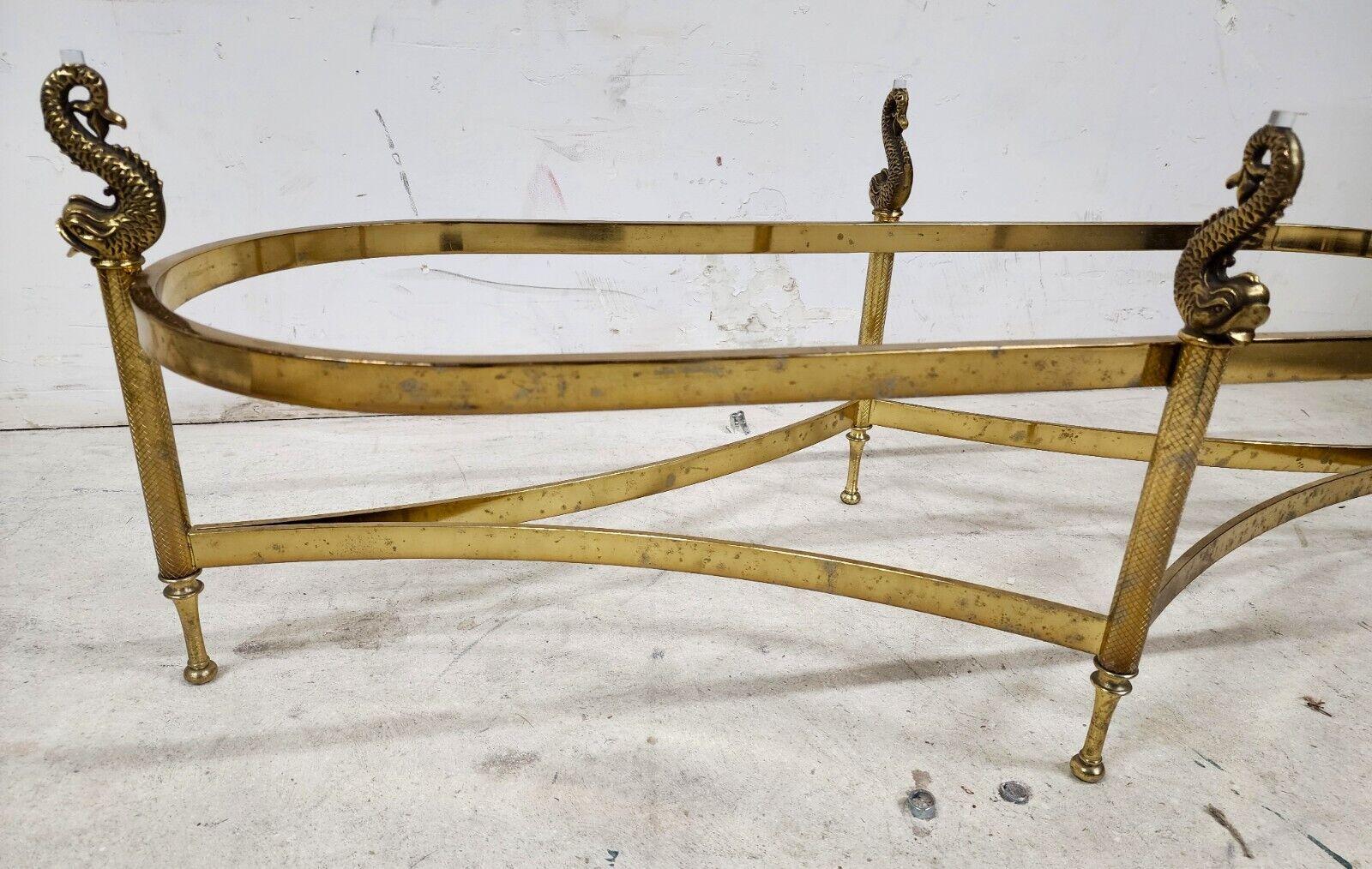 Late 20th Century Italian Brass Coffee Table with Dolphins Supporting Glass Top For Sale