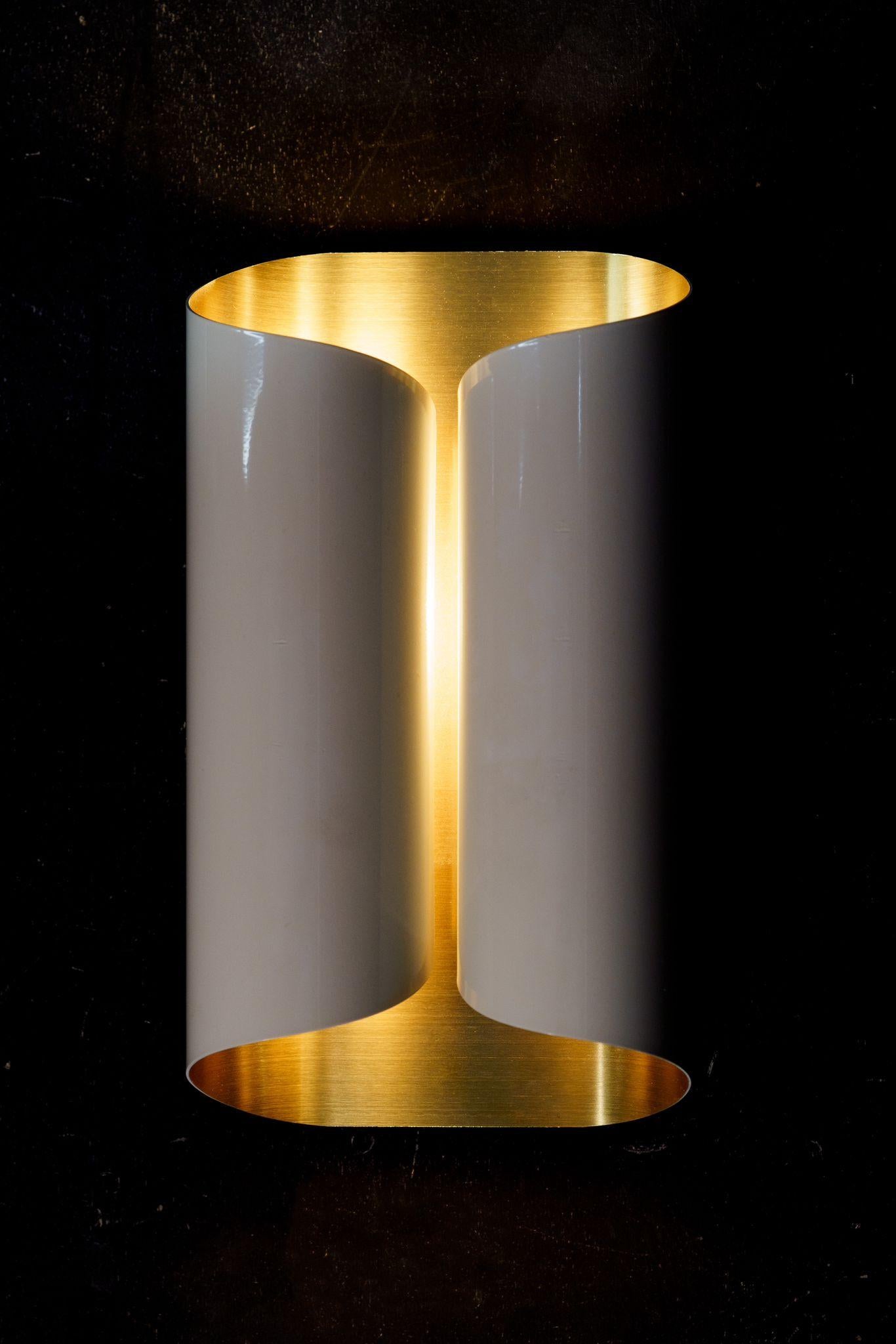 Made in exclusive for an hotel in Salsomaggiore, is all in brass, very elegant and perfect proportion, the quality is top level for thickness of the brass and way of construction, looks like the style of vico magistretti.