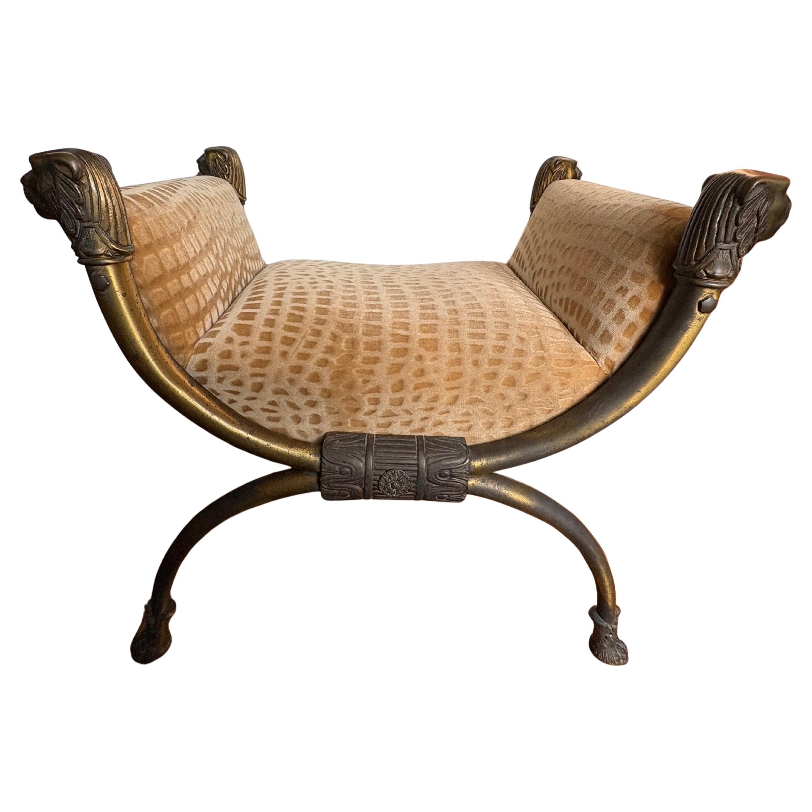 Panchina italiana in ottone a curule con teste di leone