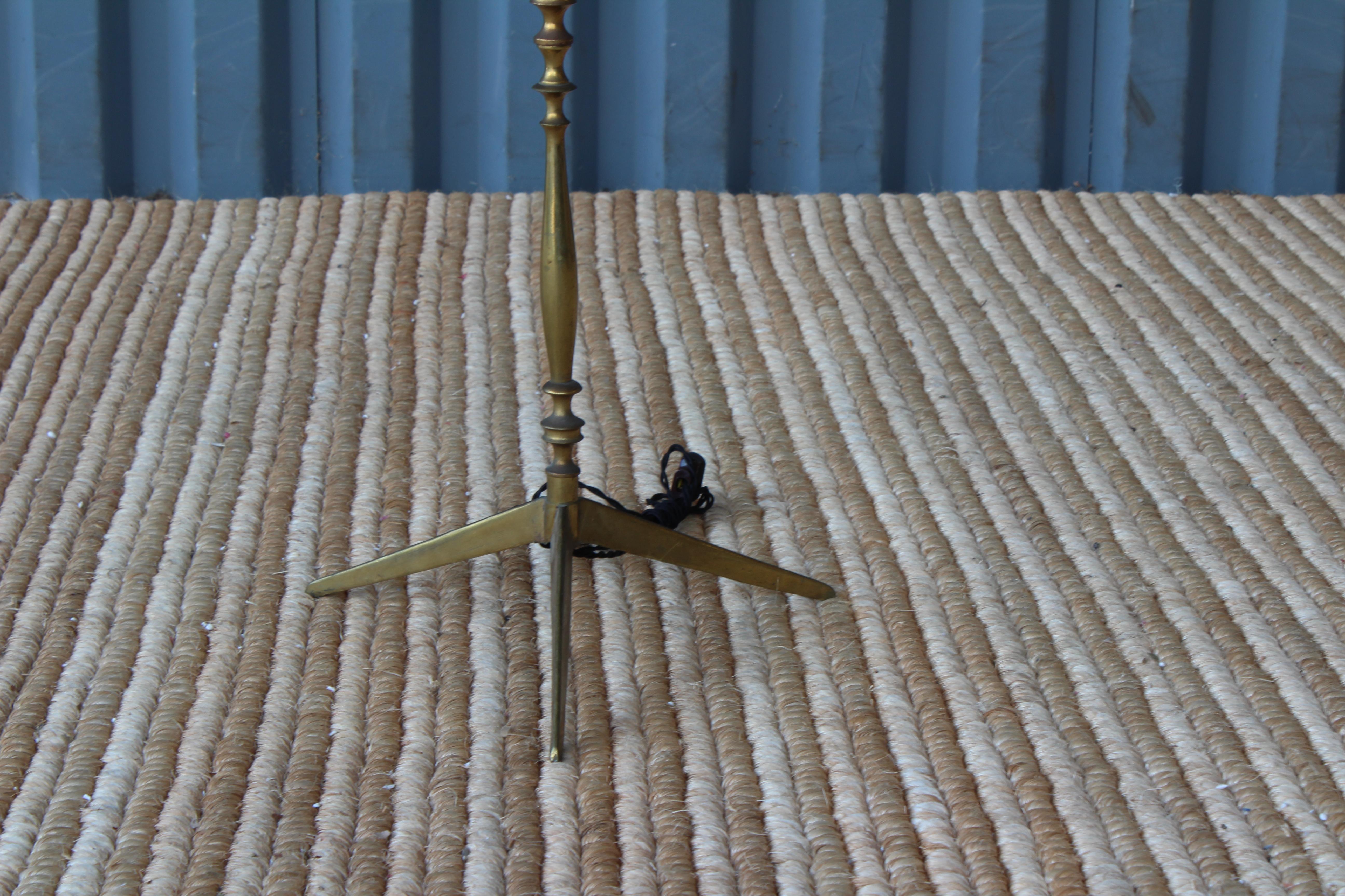 1950s Italian sculpted solid brass floor lamp. Newly rewired and fitted with a custom silk shade.