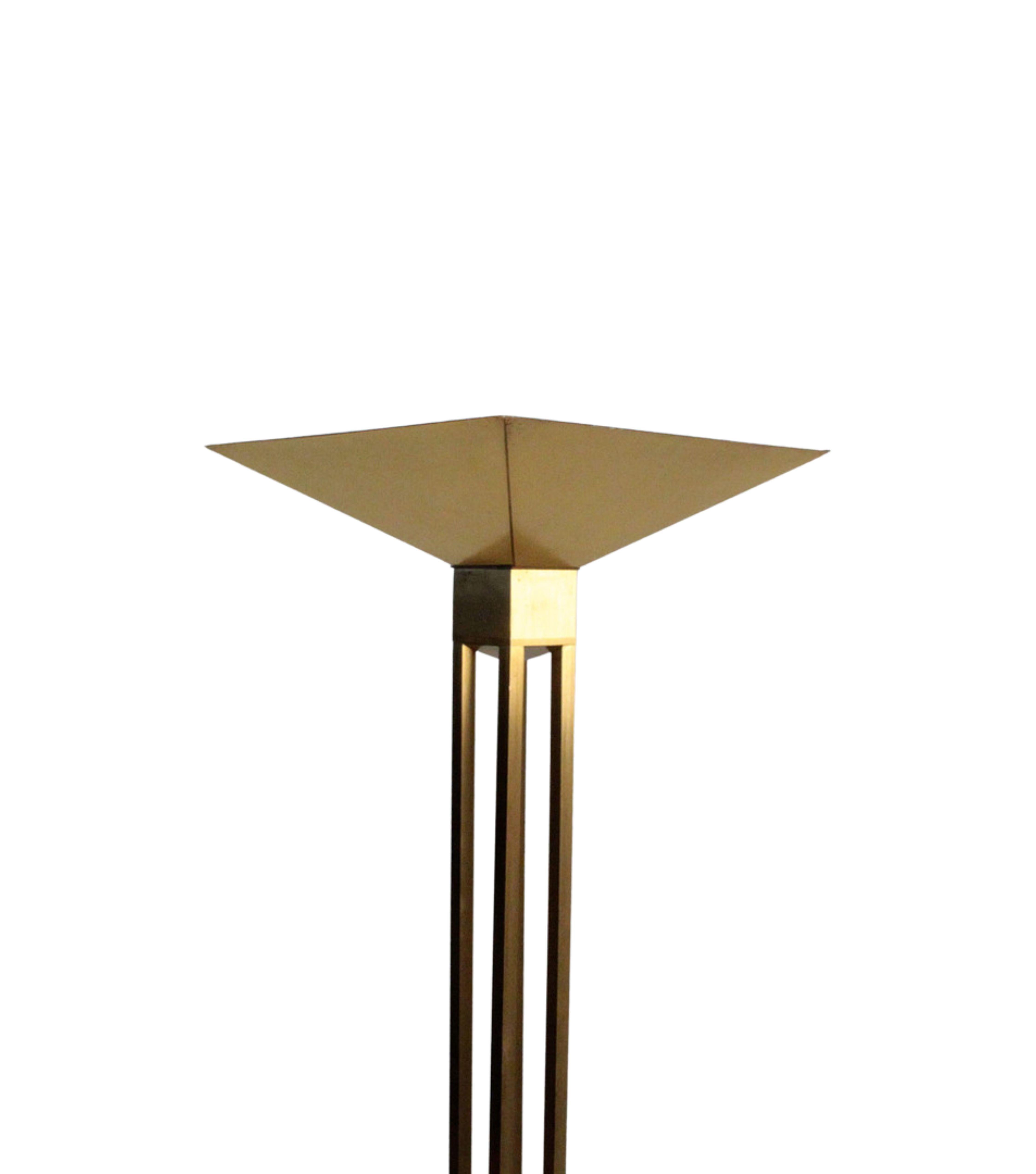 This Italian-made floor lamp is a stunning example of 1970s design, crafted from high-quality brass. Its sleek and minimalist design features an uplighter that provides a soft and diffused glow, creating a warm and inviting atmosphere in any room.