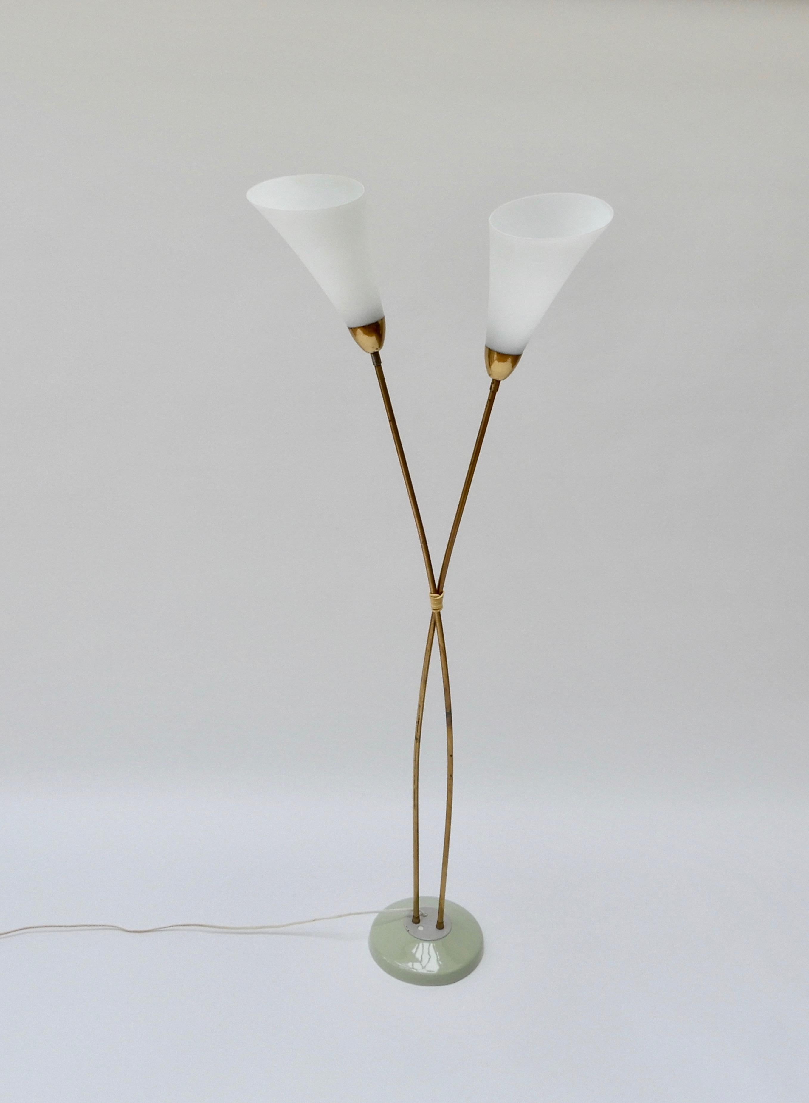 Italian brass two-armed floor lamp with two opaline glass shades, 1950s.
 