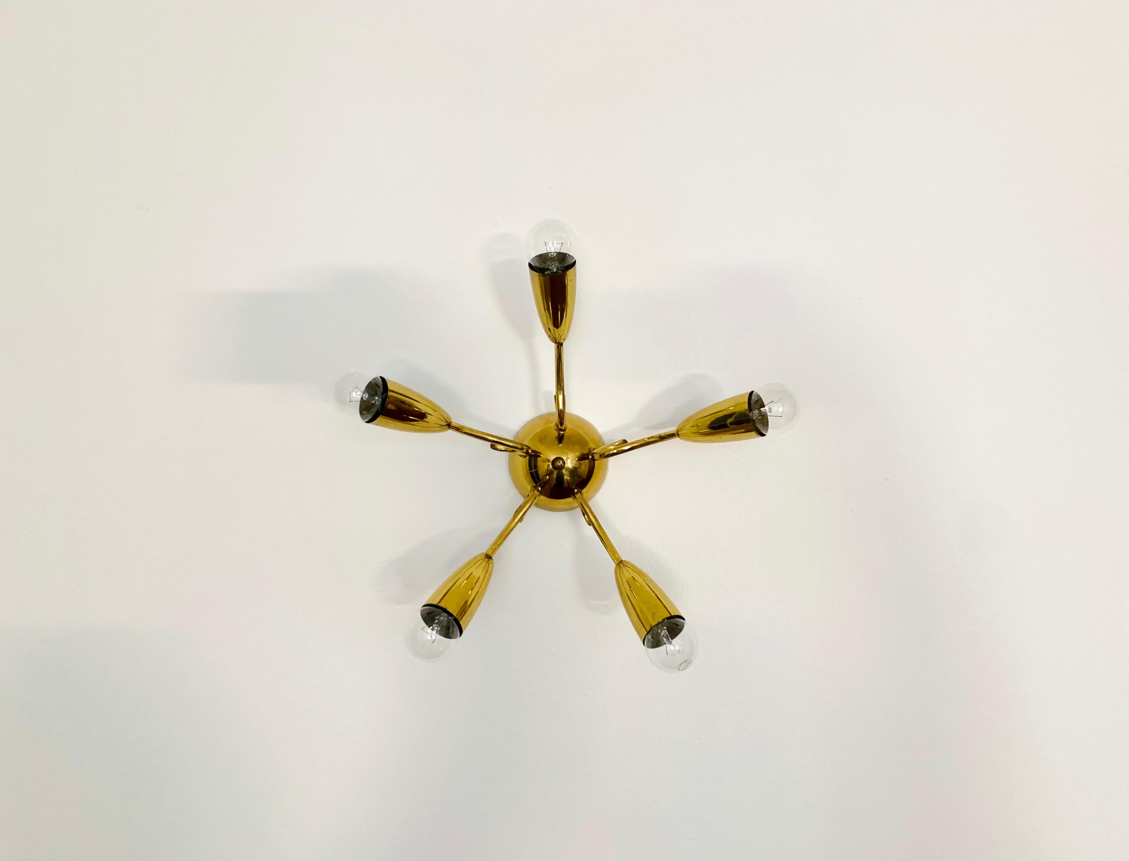 Exceptional Italian ceiling lamp from the 1950s.
Very decorative and high-quality workmanship.
Wonderful design and an asset to any home.

Condition:

Very good vintage condition with slight signs of age-related wear.
The metal parts are beautifully