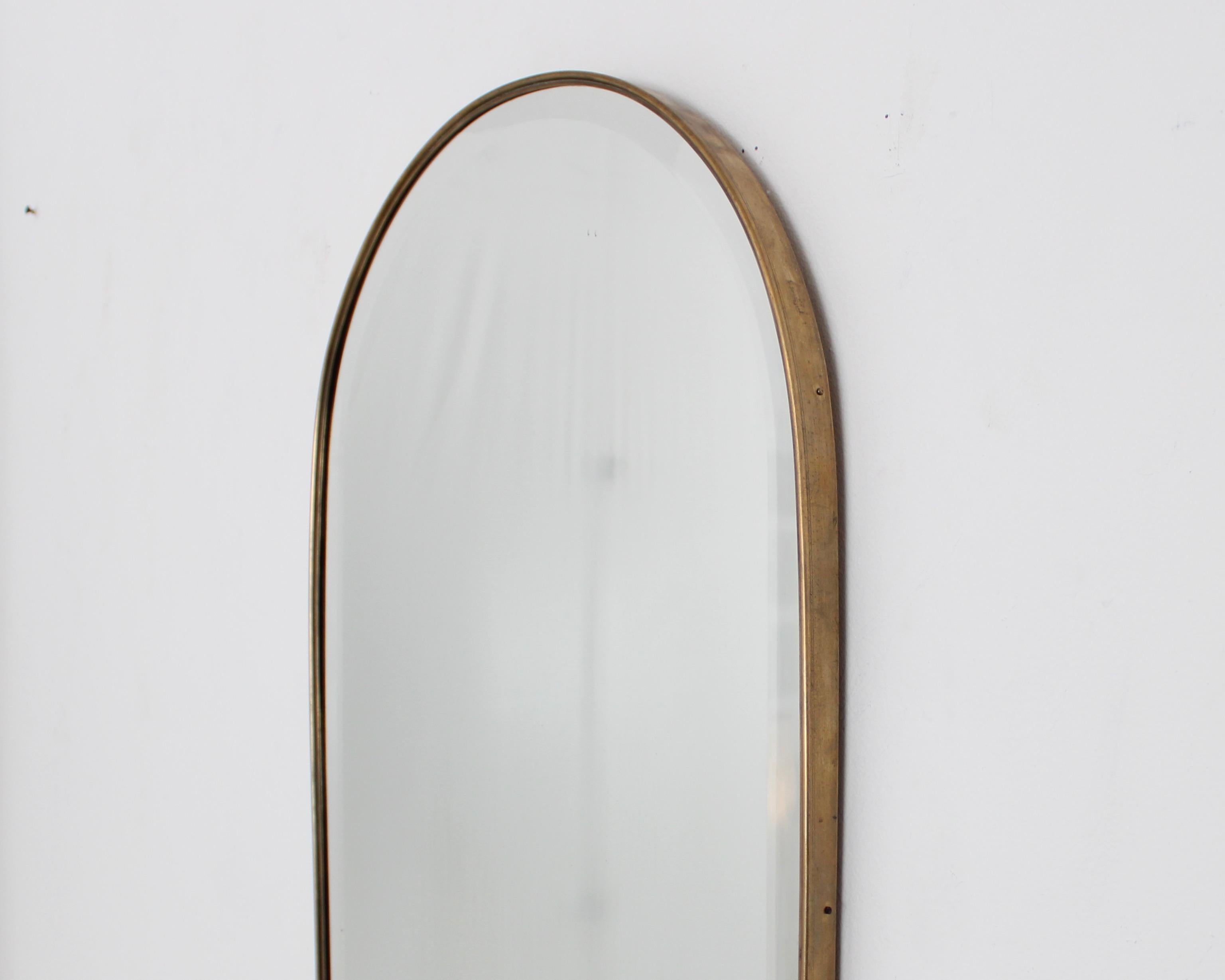 brass arch mirror
