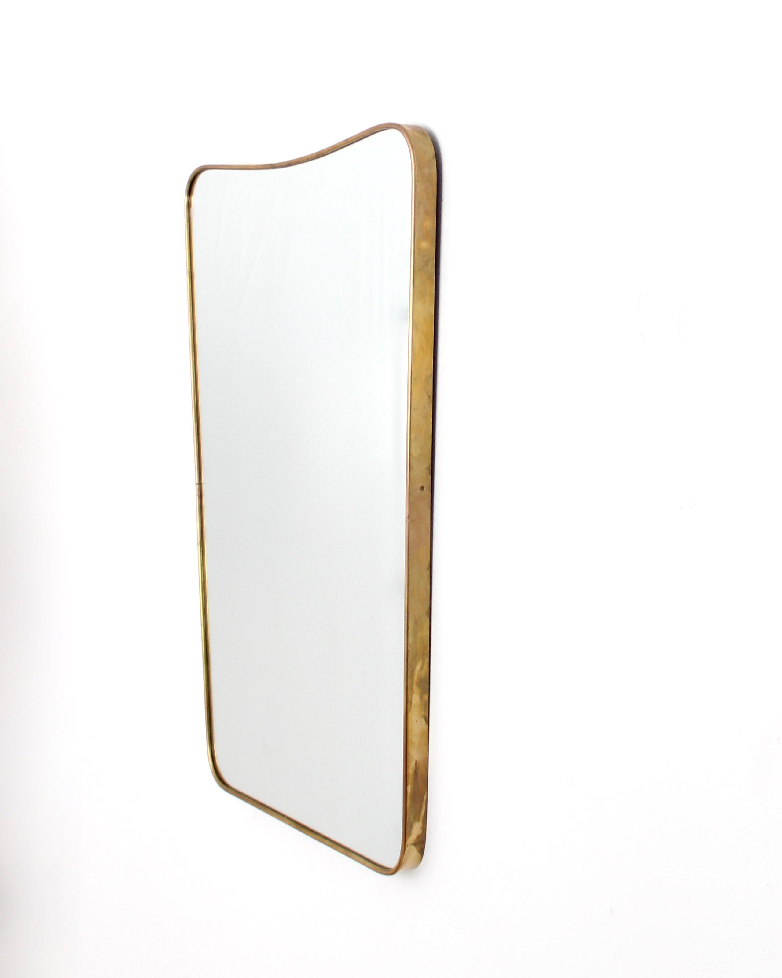 Italian Brass Framed Curved Top Vintage Shield Shaped Mirror In Good Condition In Chicago, IL