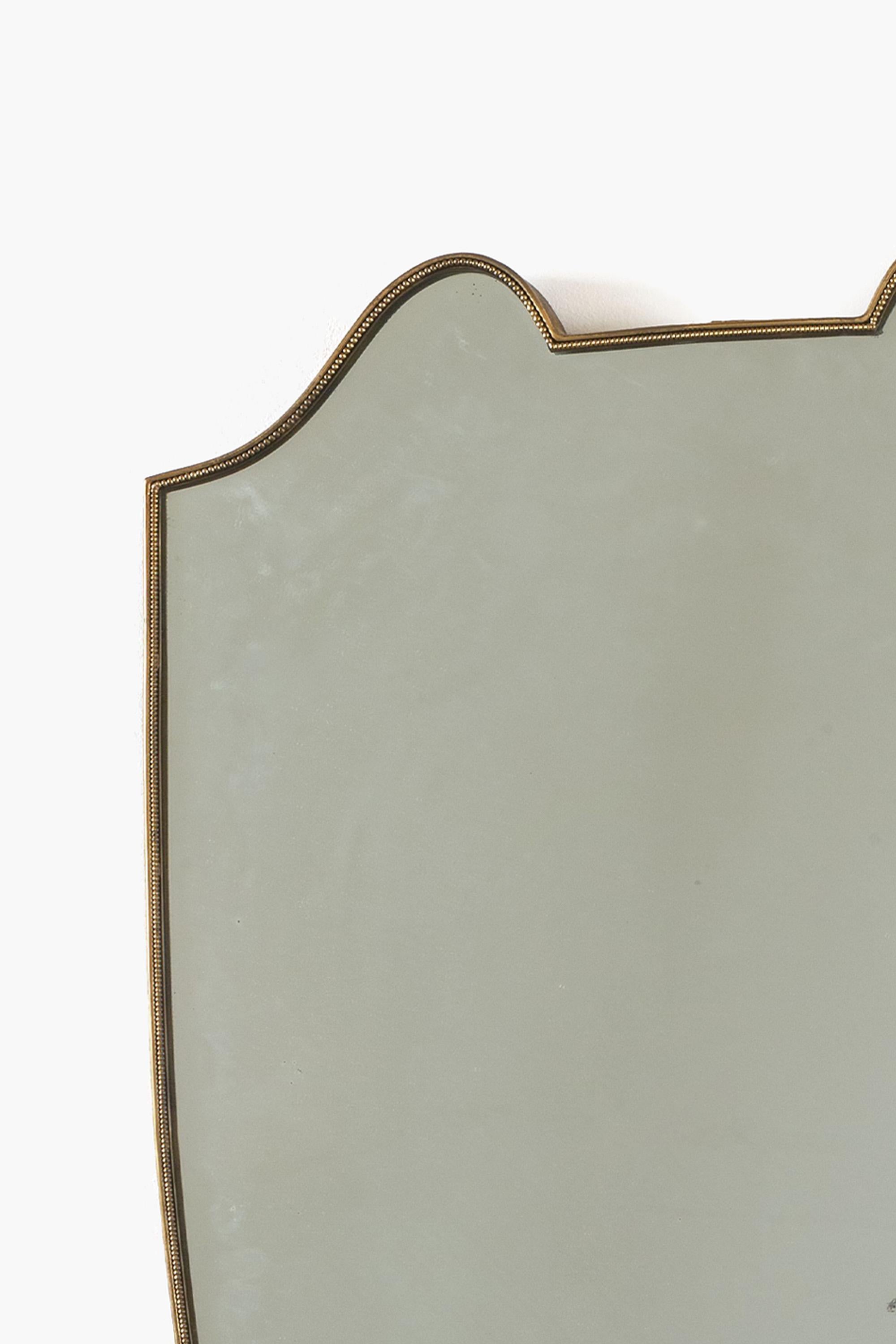 Mid-Century Modern Italian Brass Framed Shield Mirror in the style of Gio Ponti For Sale