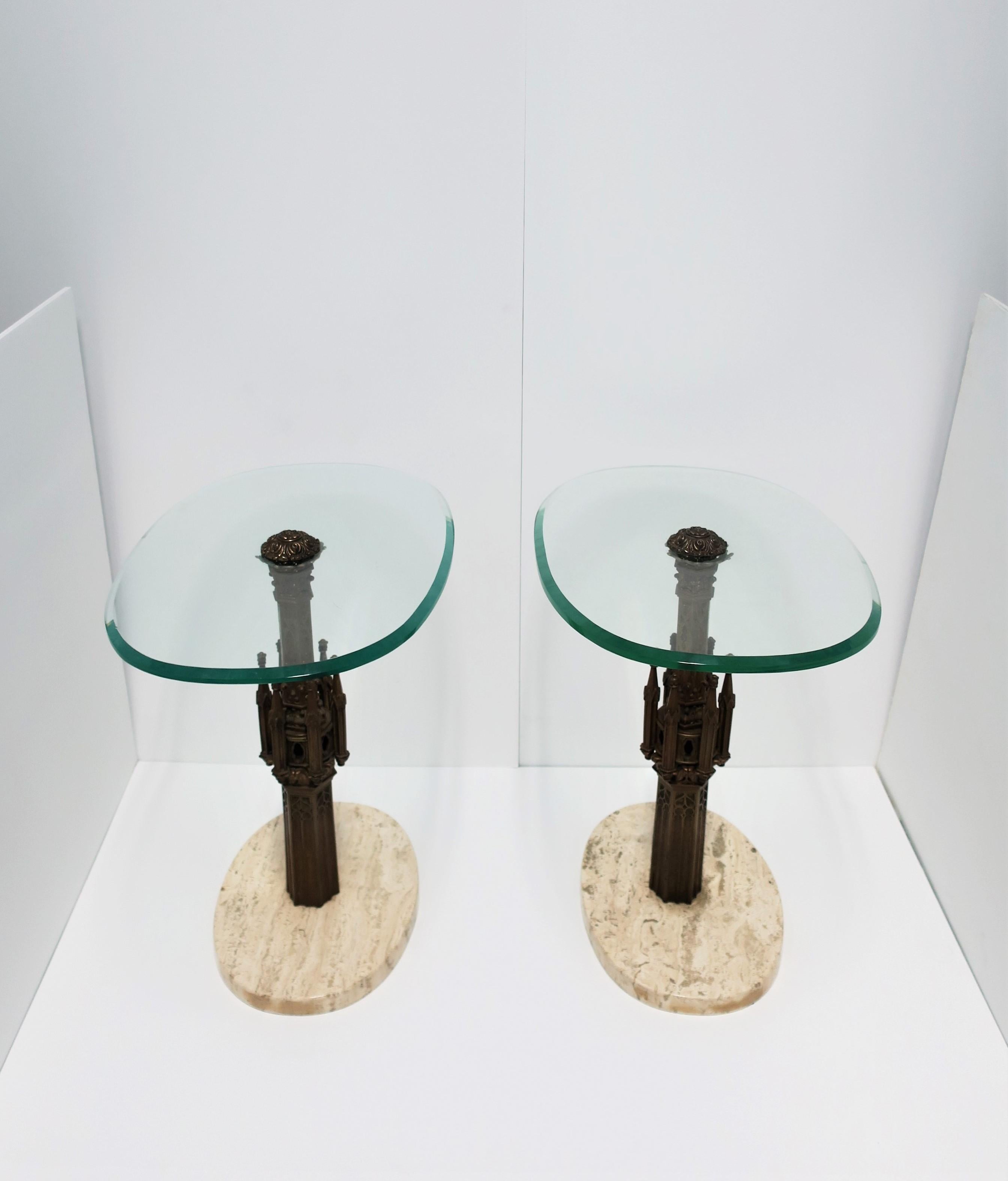 A very special and stunning pair of Italian brass or bronze, glass, and travertine marble end or side tables with detailed Italian Gothic architecture bronze/brass frame, circa mid-20th century, 1960s, Italy. Tables have substantial oval glass tops