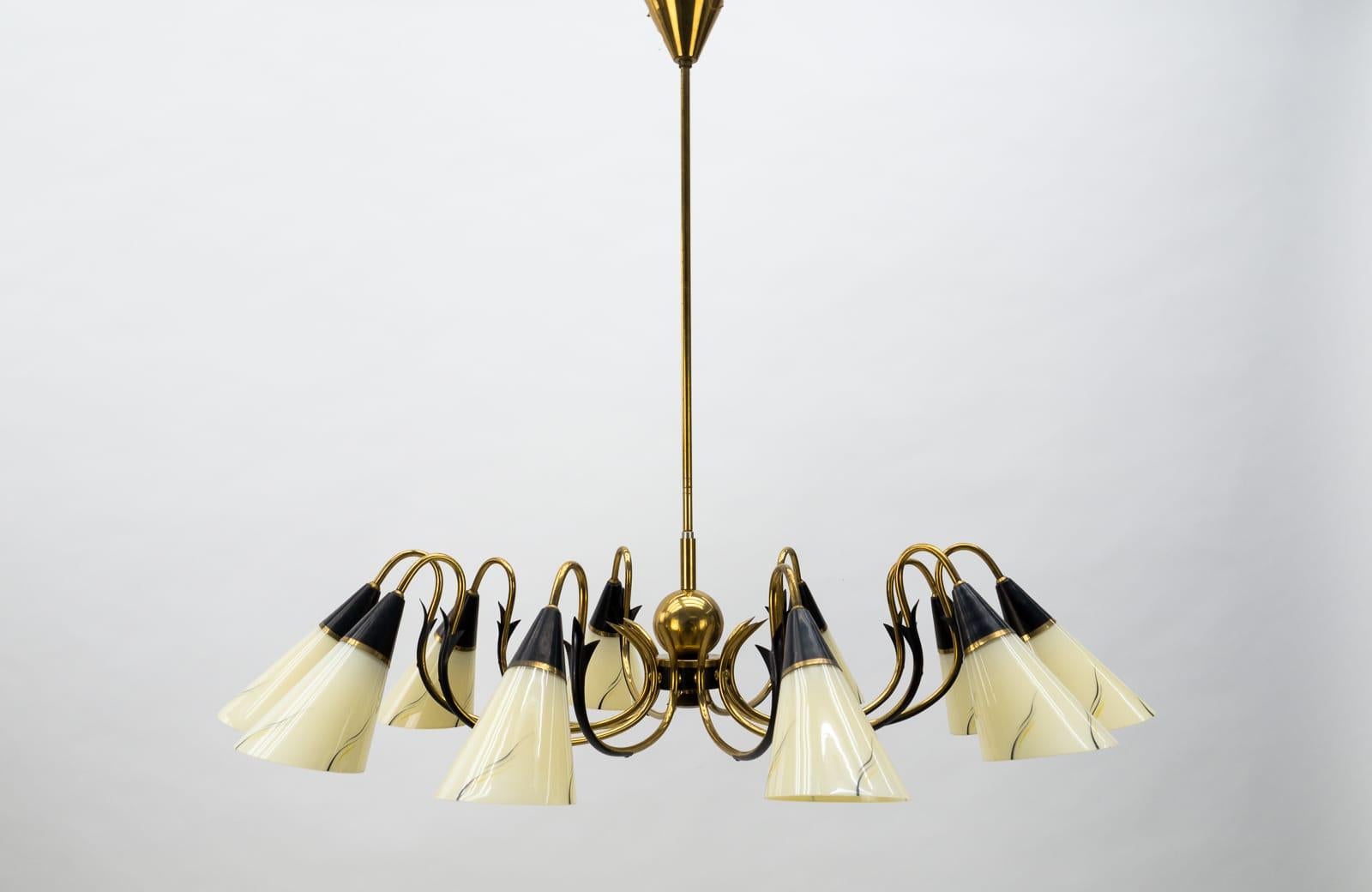 Mid-Century Modern 10-armed brass sputnik lamp from Italy, 1950s.

Fully functional.

Ten E14 sockets. Works with 220V and 110V.

Wiring is suitable for all countries.