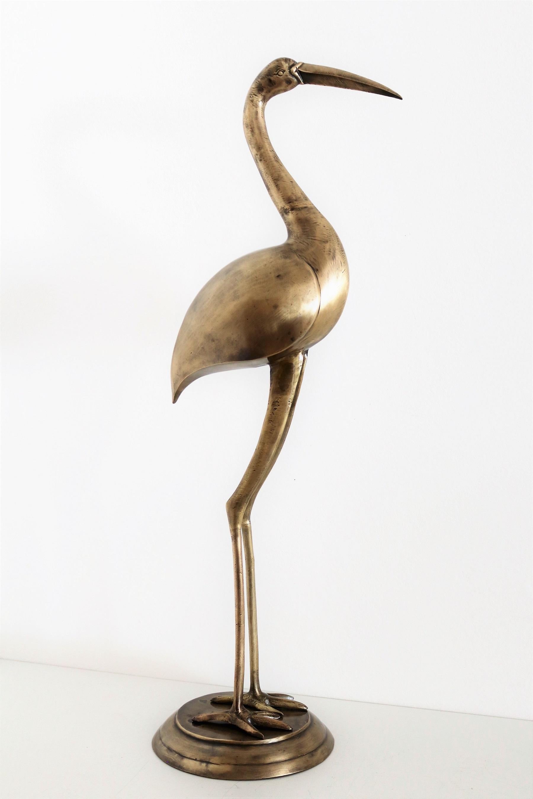 brass heron figurine