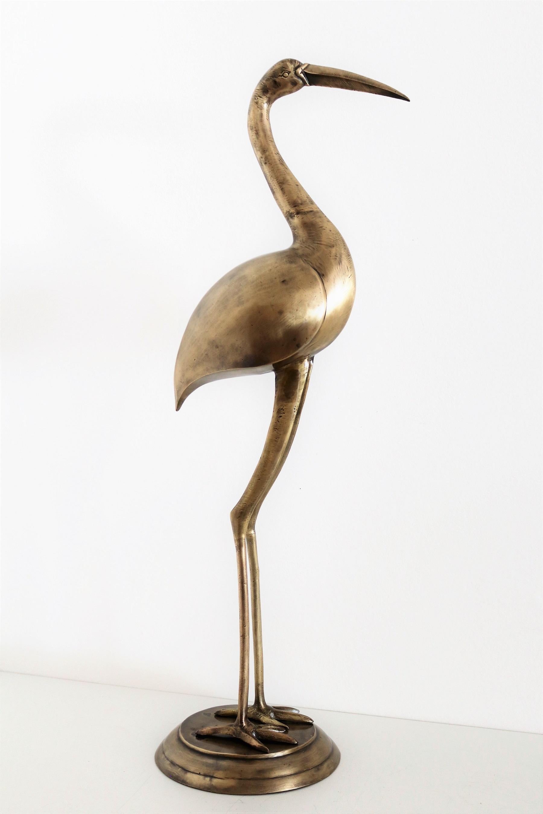 brass crane statue