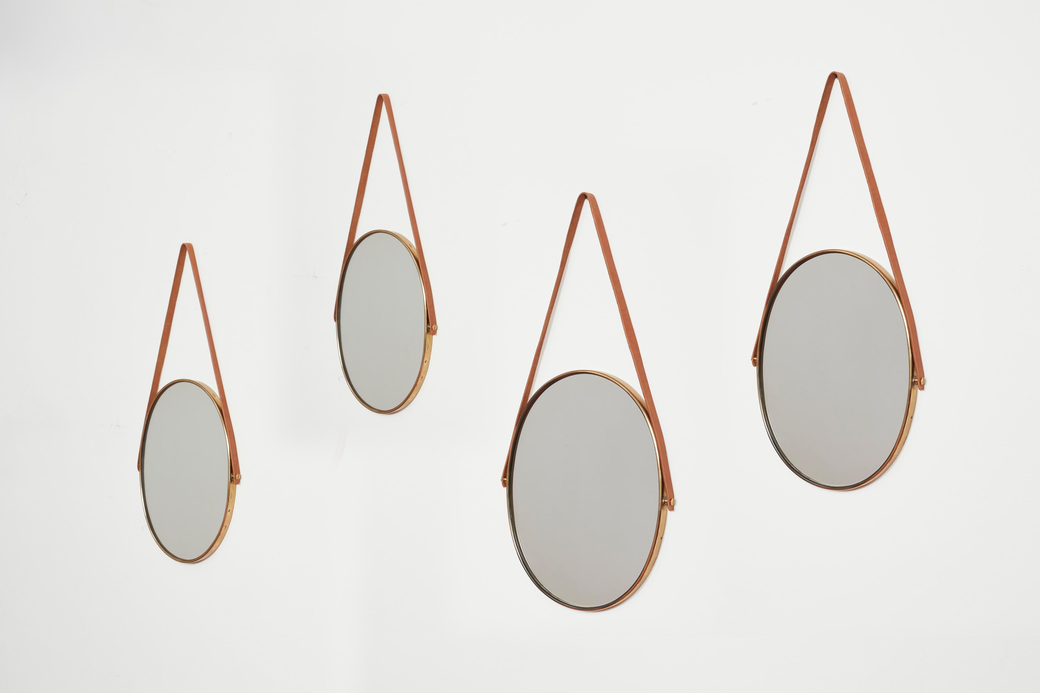 Italian 1950s brass and leather mirrors.
Thick brass edges - heavy and well made.
Priced individually
Four available.