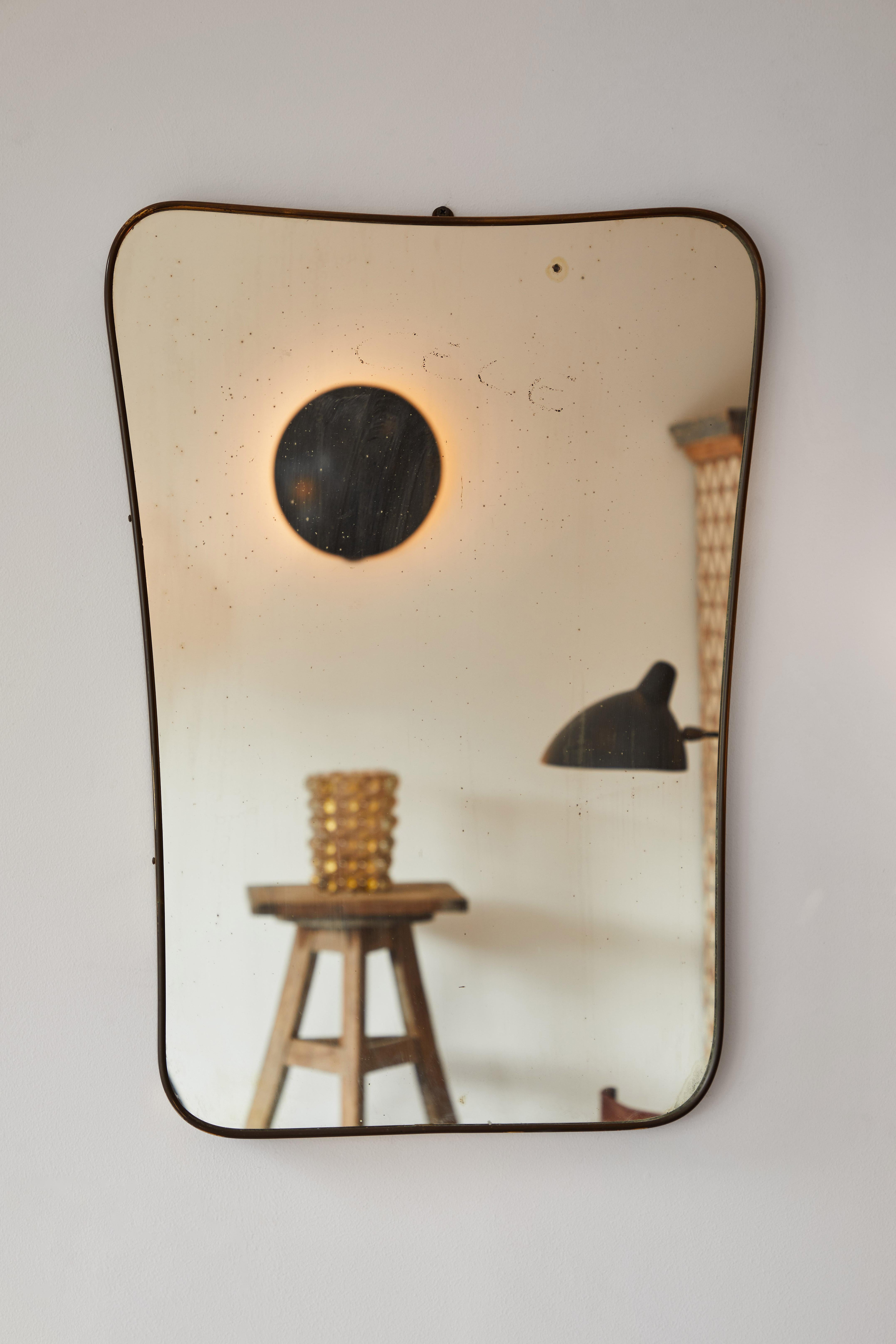 Italian patinated brass framed wall mirror. Made in Italy, circa 1960s.