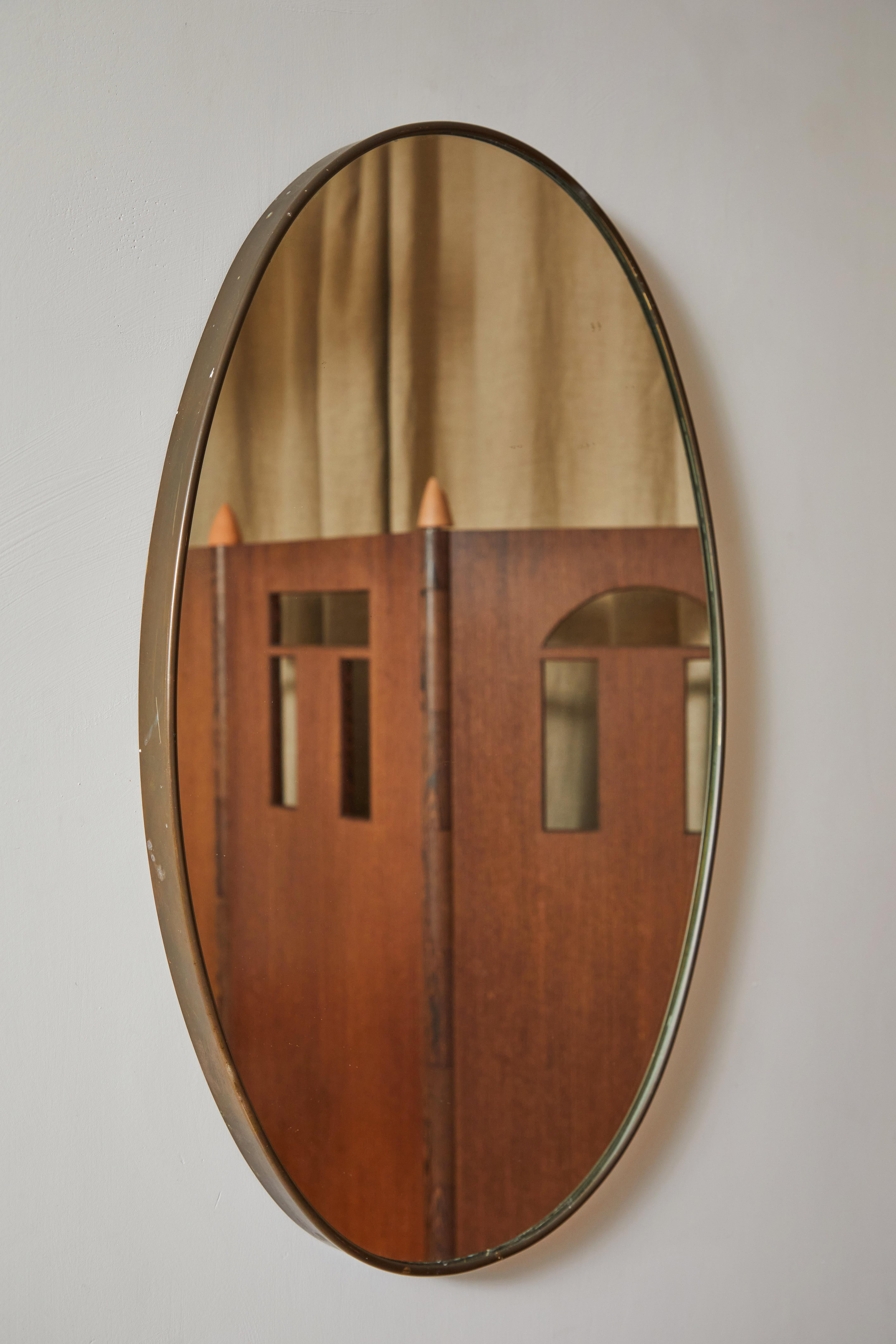 Italian patinated brass framed wall mirror. Made in Italy, circa 1960s.