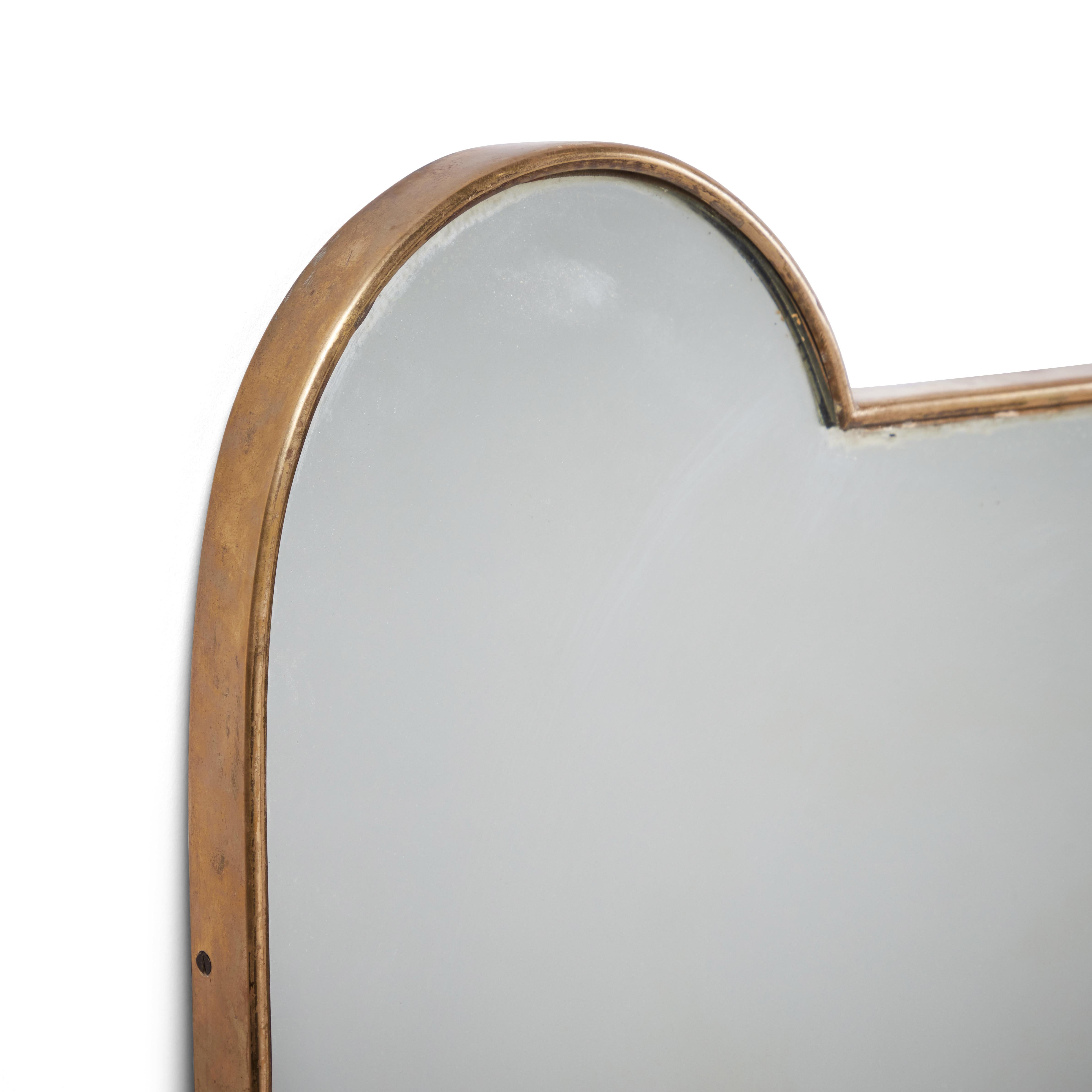 Italian patinated brass framed wall mirror. Made in Italy circa 1960s.