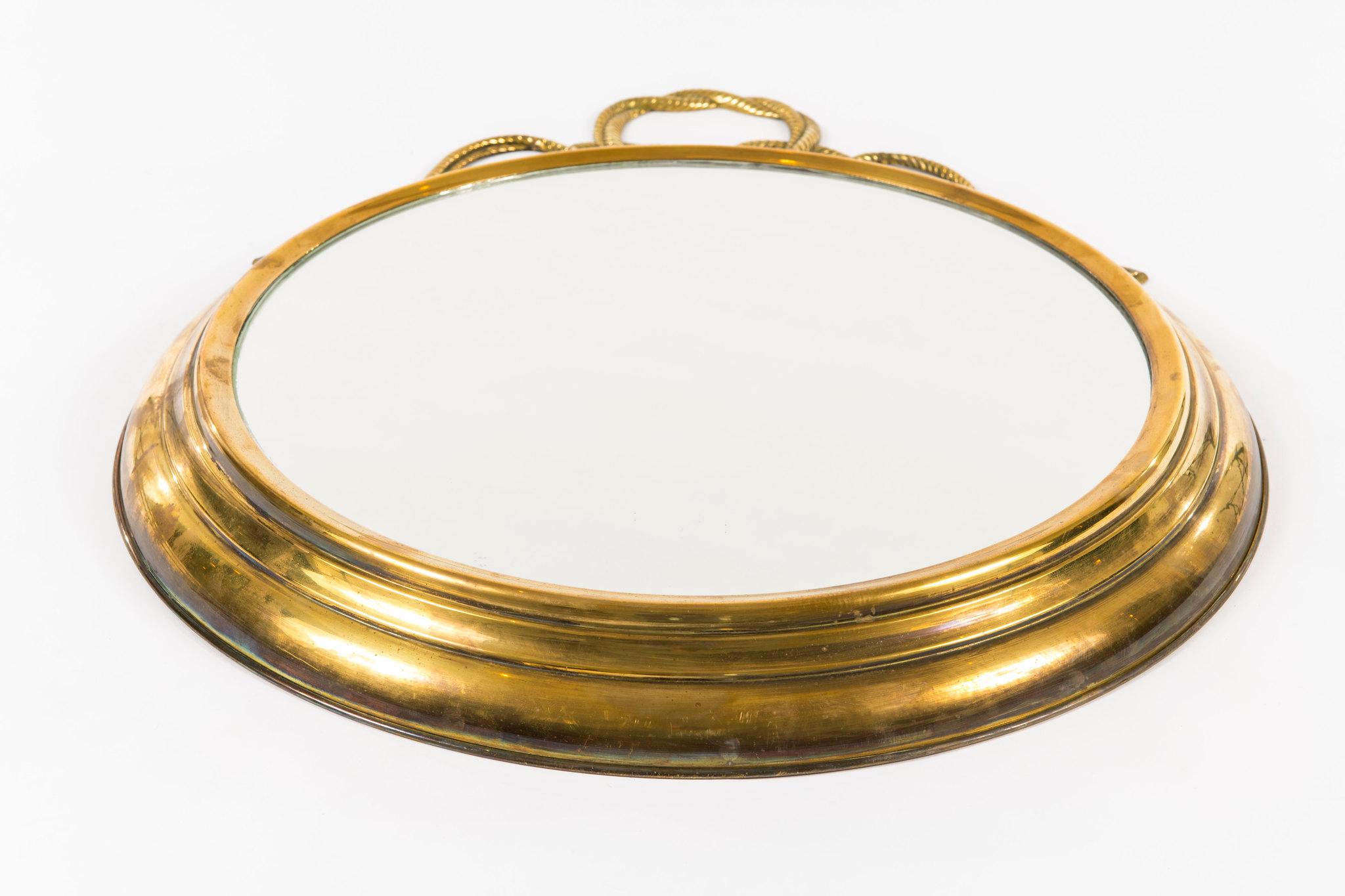 Vintage Italian brass mirror with rope detail.