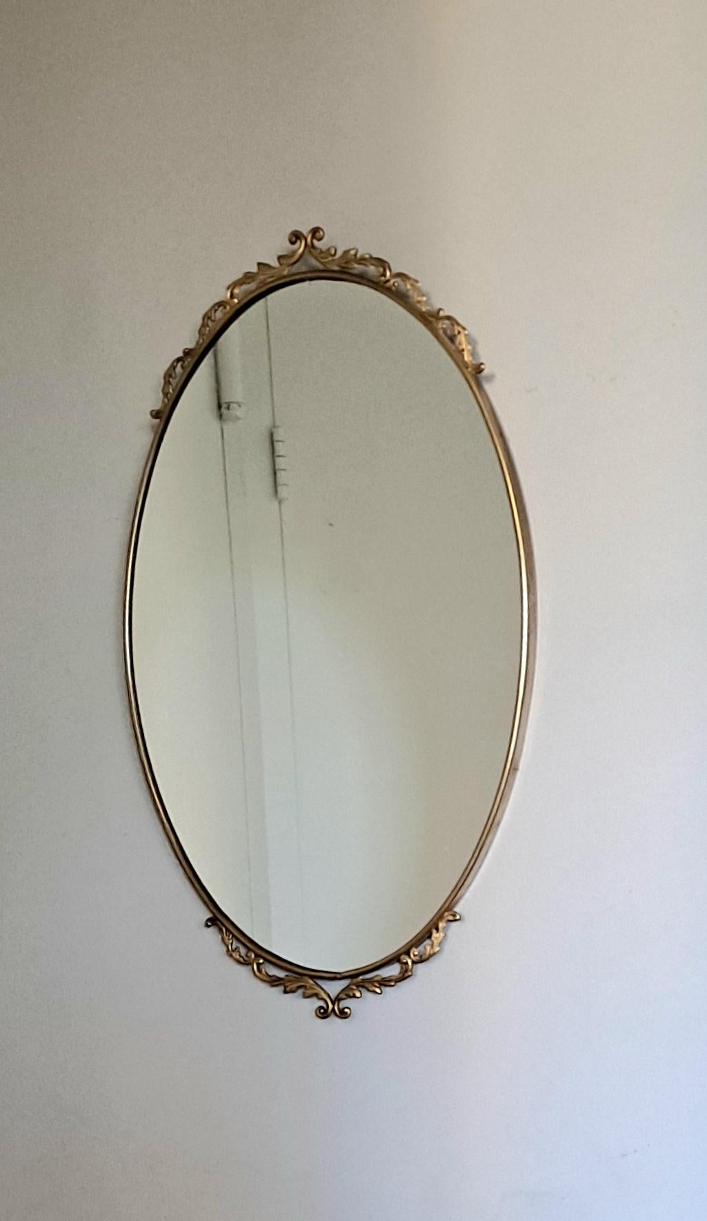 Mid-20th Century Italian Brass Mirror with the Filigree on Top and Bottom For Sale