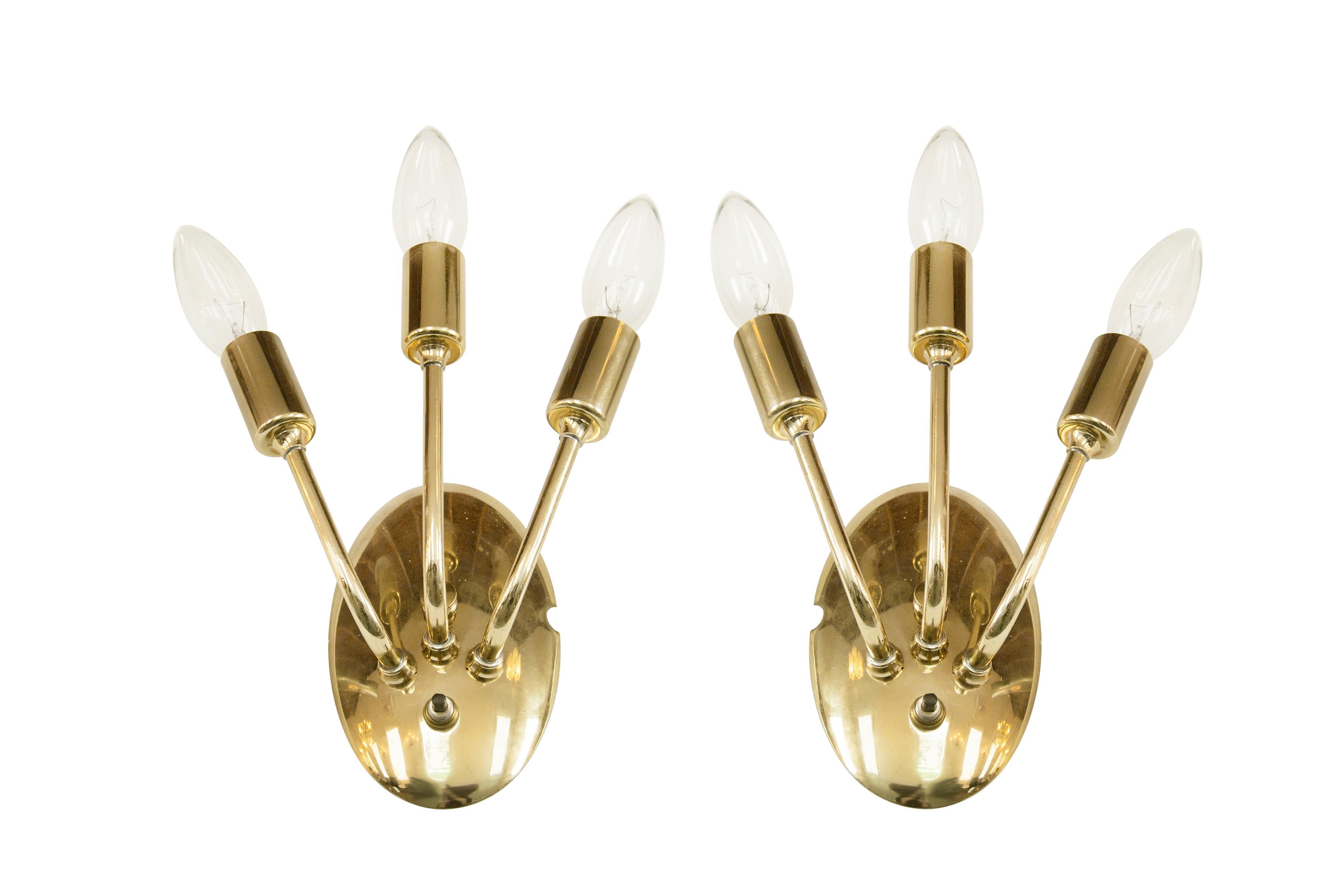 Pair of sconces original from Italy, circa 1950s. Brass has been hand polished. Fully rewired.