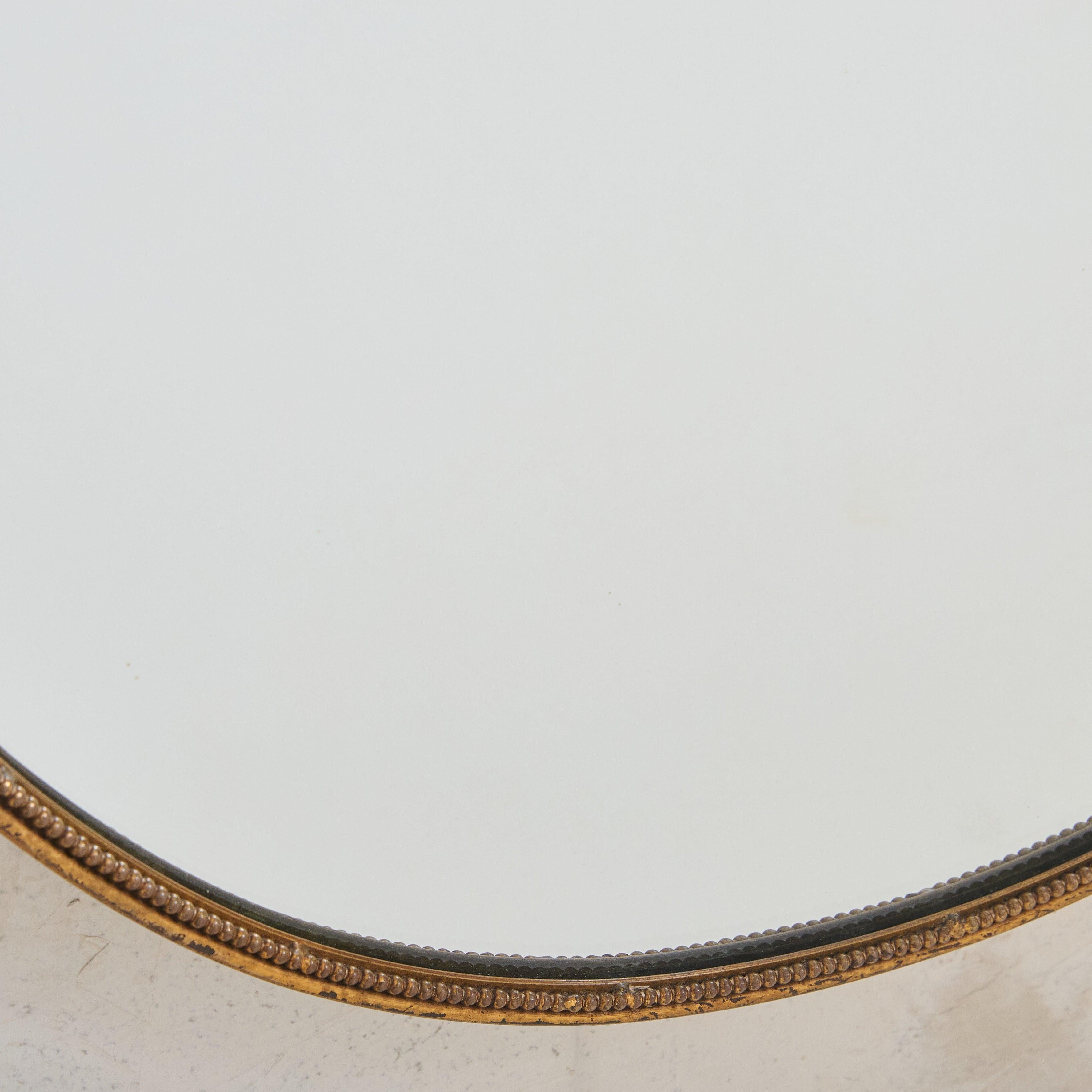 Mid-Century moderno Specchio da parete italiano a forma di scudo in ottone n. 1, anni '70 in vendita