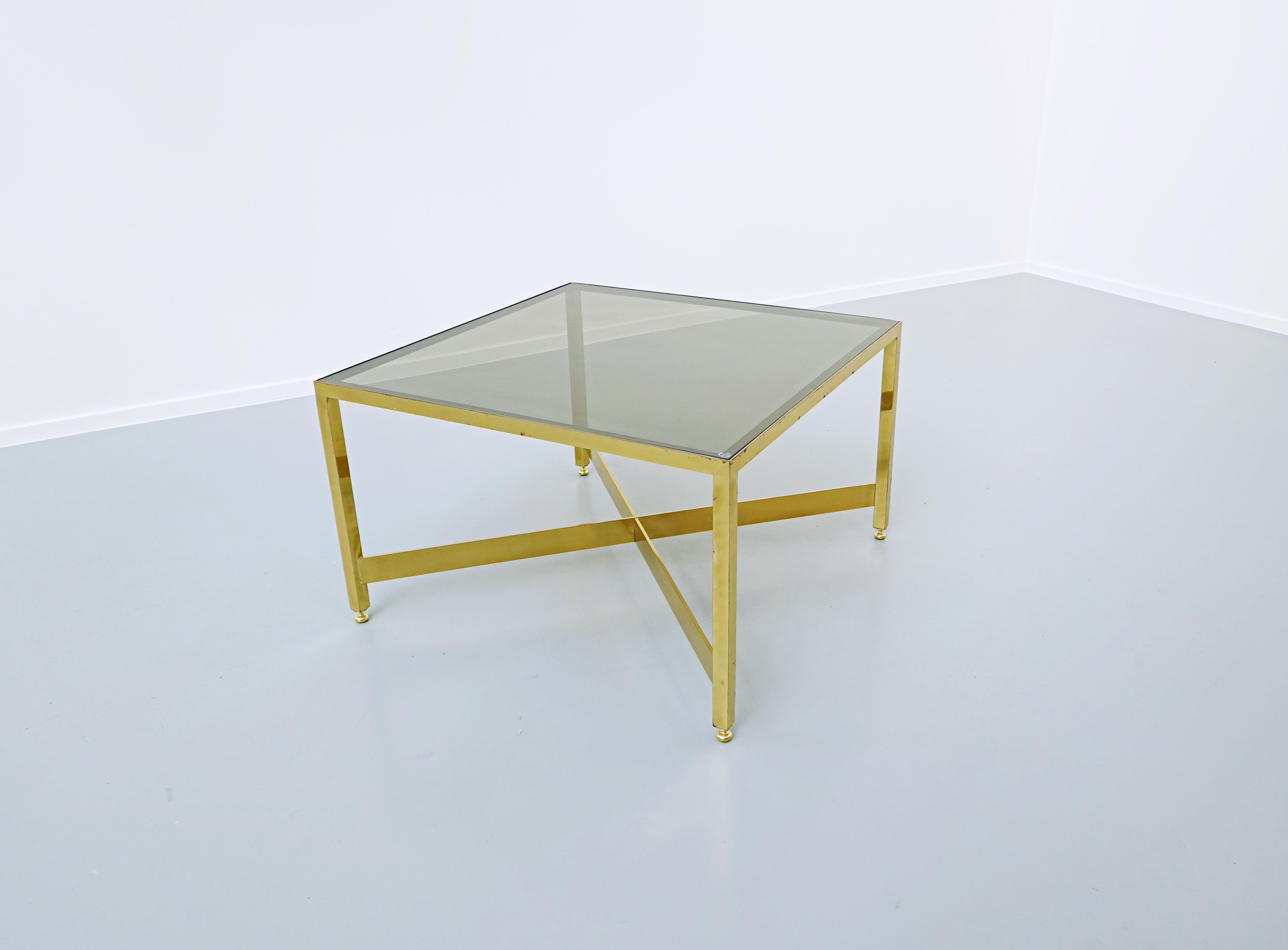 Italian brass side table with glass top, 1970s.