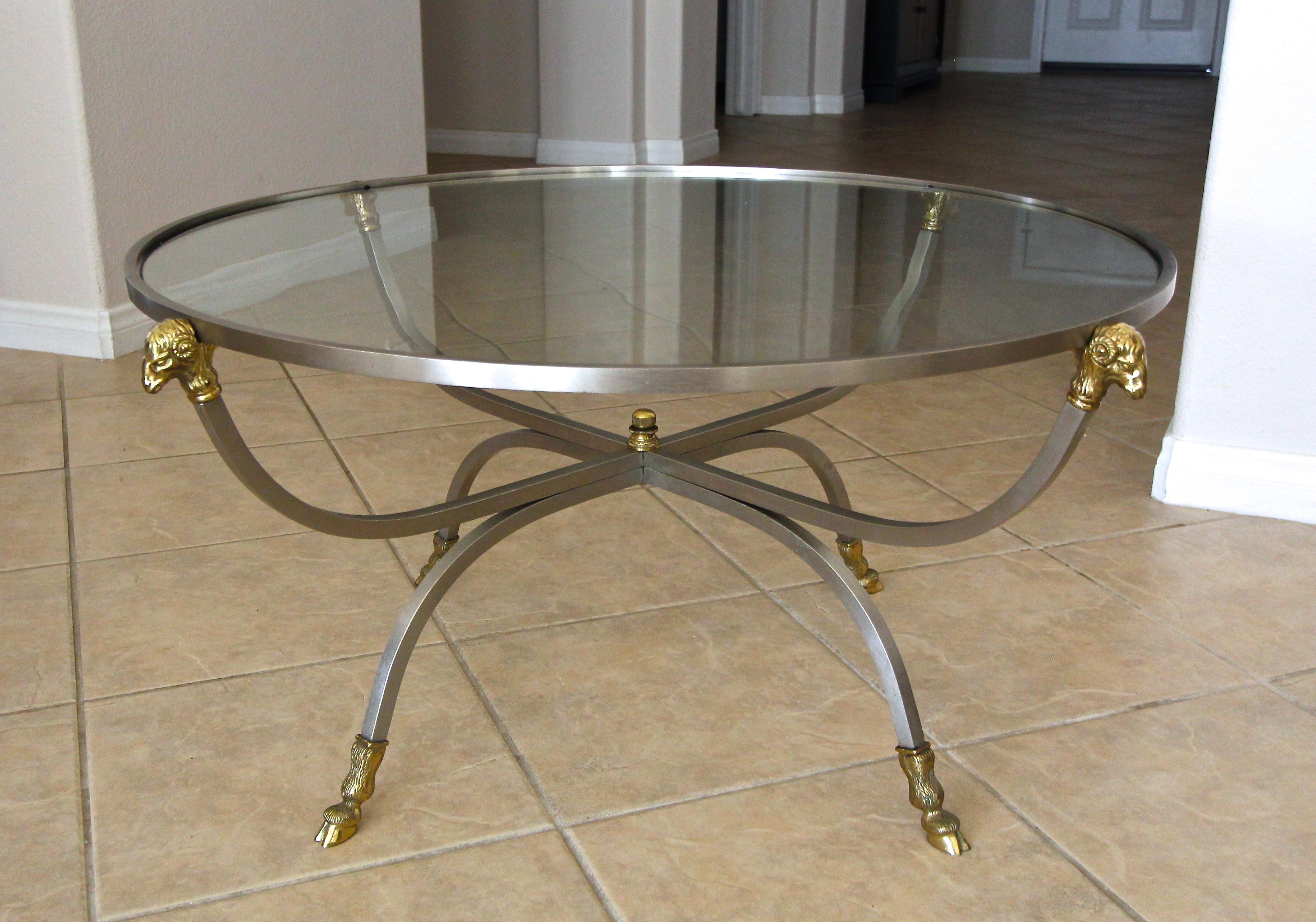 Italian steel and brass round cocktail or coffee table with ram's head and hoof detailing, stamped on frame 