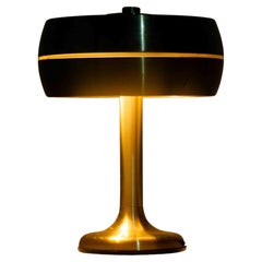 Italian brass table desk lamp with sculptural base and glowing band, 1960s