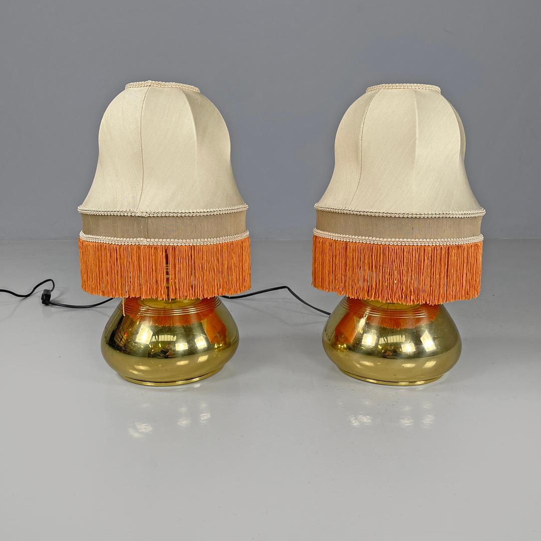 Late 20th Century Italian brass table lamps with beige lampshade and orange fringes, 1980s For Sale