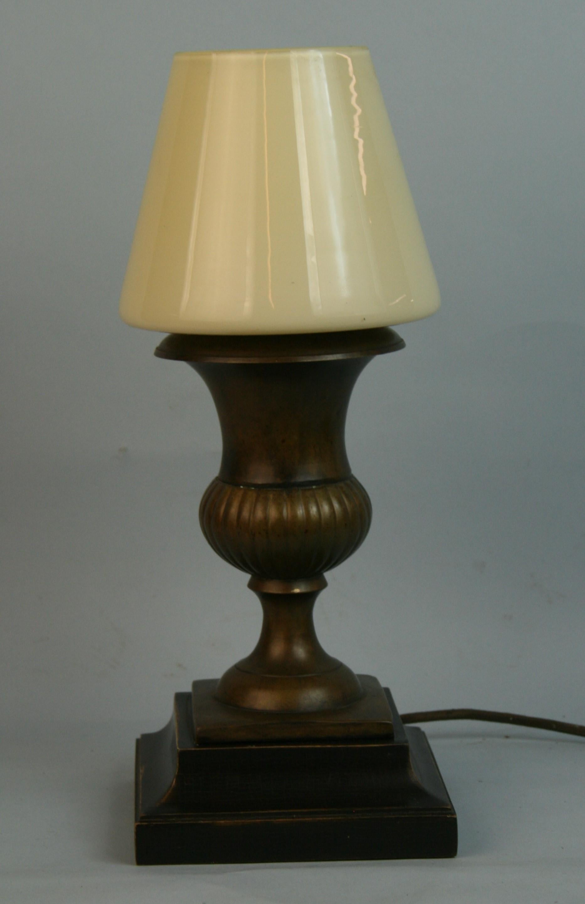 1300 Italian brass urn lamp with Murano art glass shade
2 available priced individually.