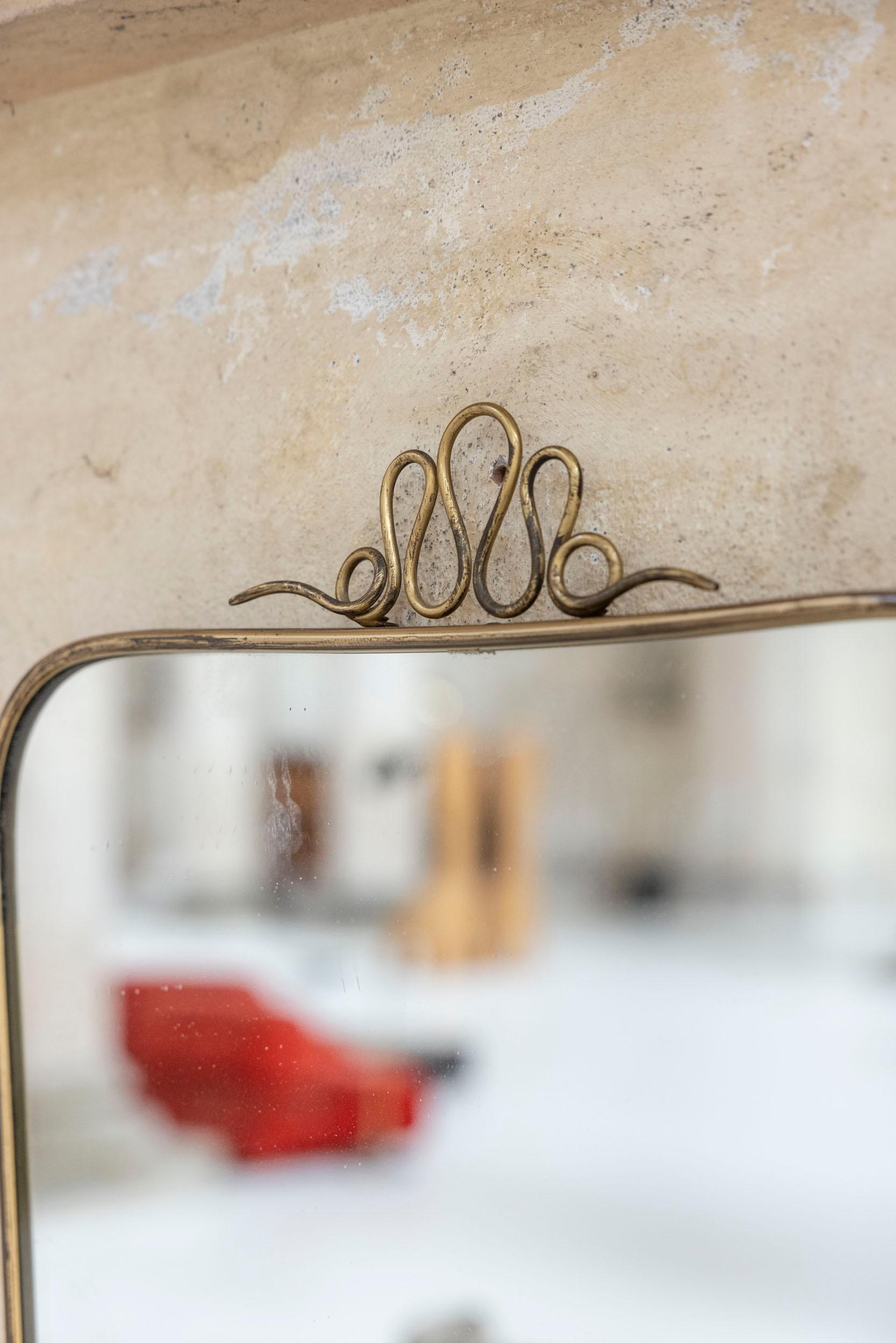 Brass Italian brass wall mirror attributed to Gio Ponti For Sale