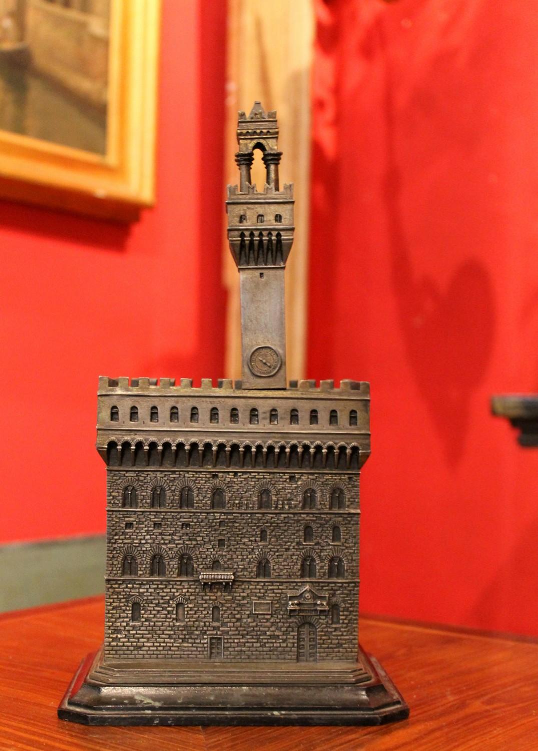 This beautiful early 20th century box is worked in the round and faithfully represents the model of the famous Palazzo Vecchio in Florence. A generously sized and well detailed live like architectural model made of metal and burnished bronze with