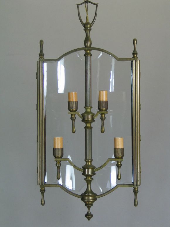 Bronze lantern. An unusual lantern in a narrow framework with bowed glass.

Four internal lights.