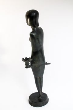 Italian Bronze mid-century modern woman sculpture (59x17x12cm).  An eye-catcher!