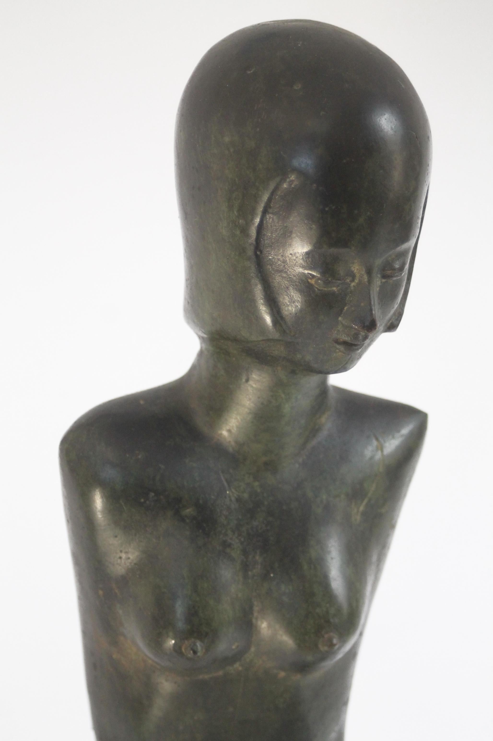 Cast Italian Bronze mid-century modern woman sculpture (59x17x12cm).  An eye-catcher! For Sale