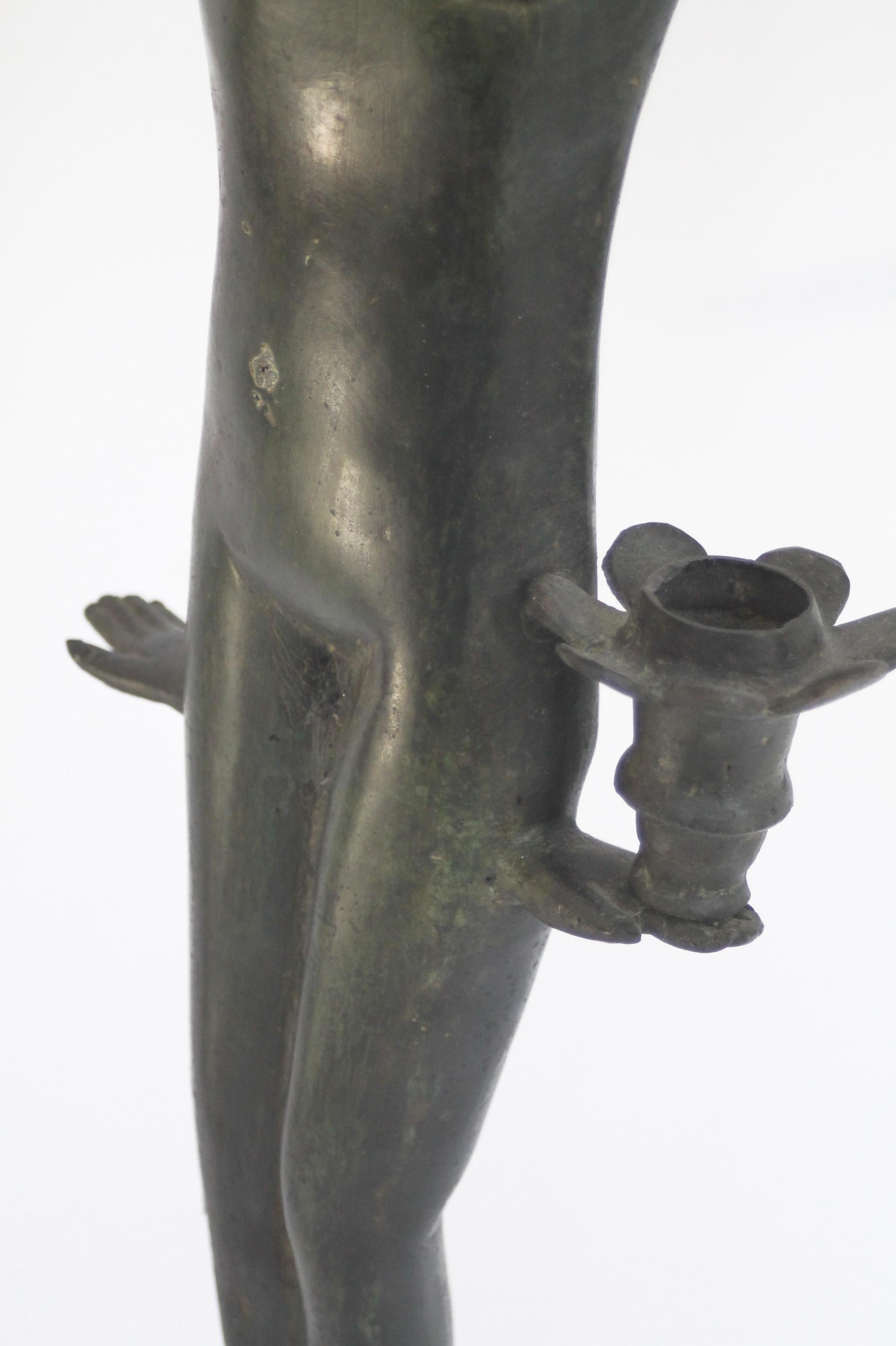 Cast Italian Bronze mid-century modern woman sculpture (59x17x12cm).  An eye-catcher! For Sale