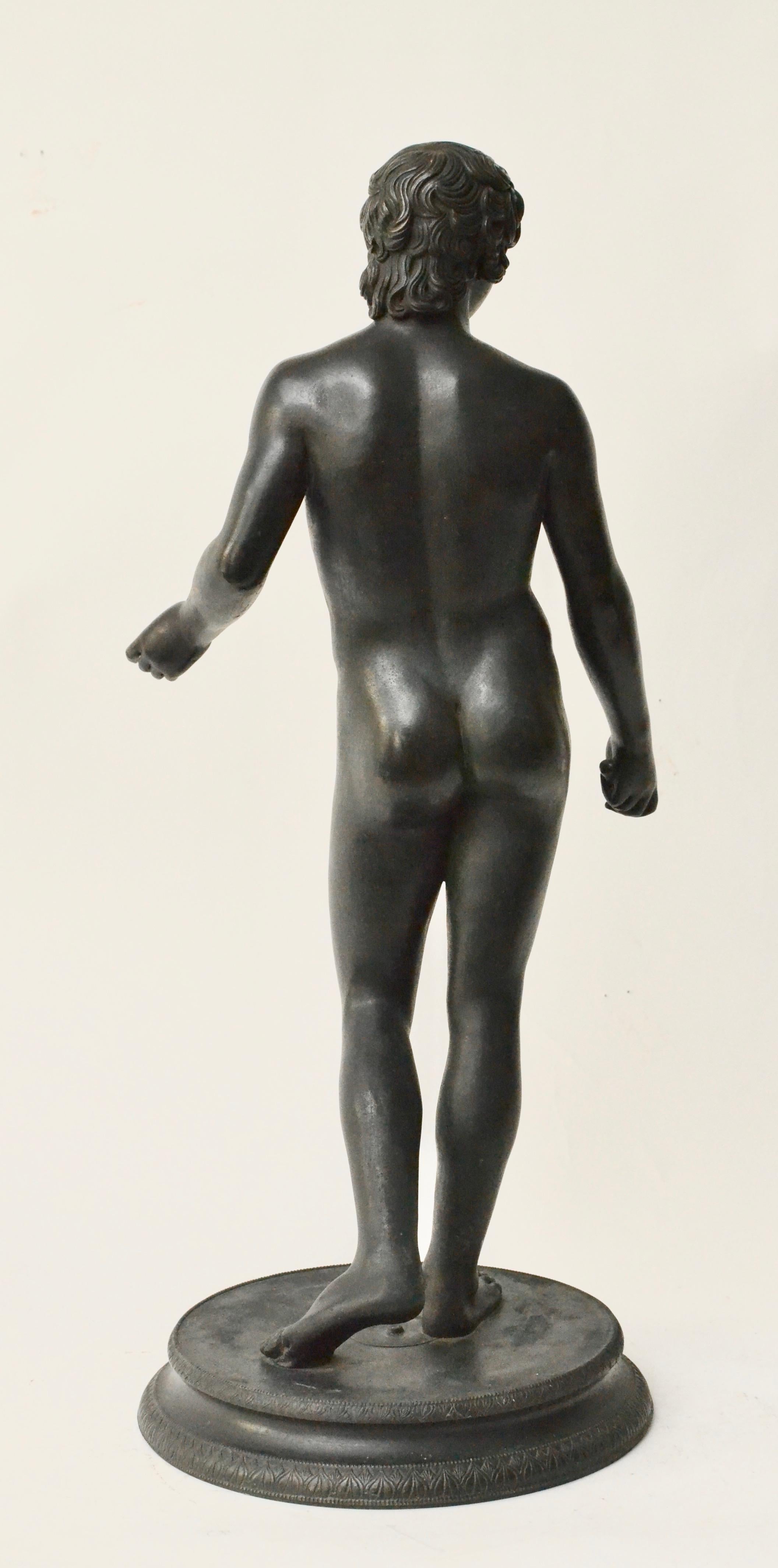 A Italian bronze sculpture of Antinous Farnese made in Neapel, 19th century. After the antique - now on display in the Naples National Archaeological Museum. 

The Antinous Farnese is a specific marble sculptural representation of Antinous, named